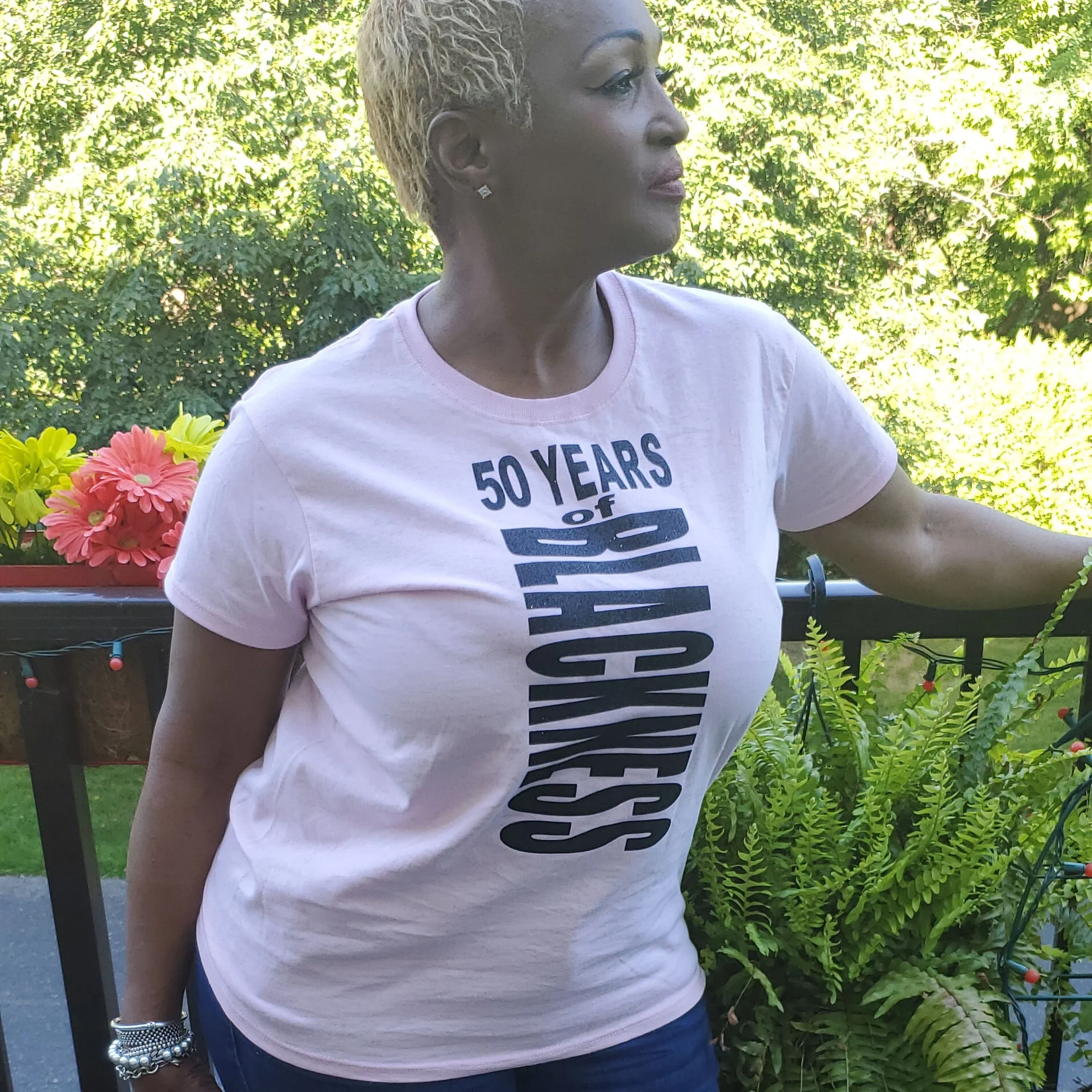 front of 50th Anniversary black letter t-shirt