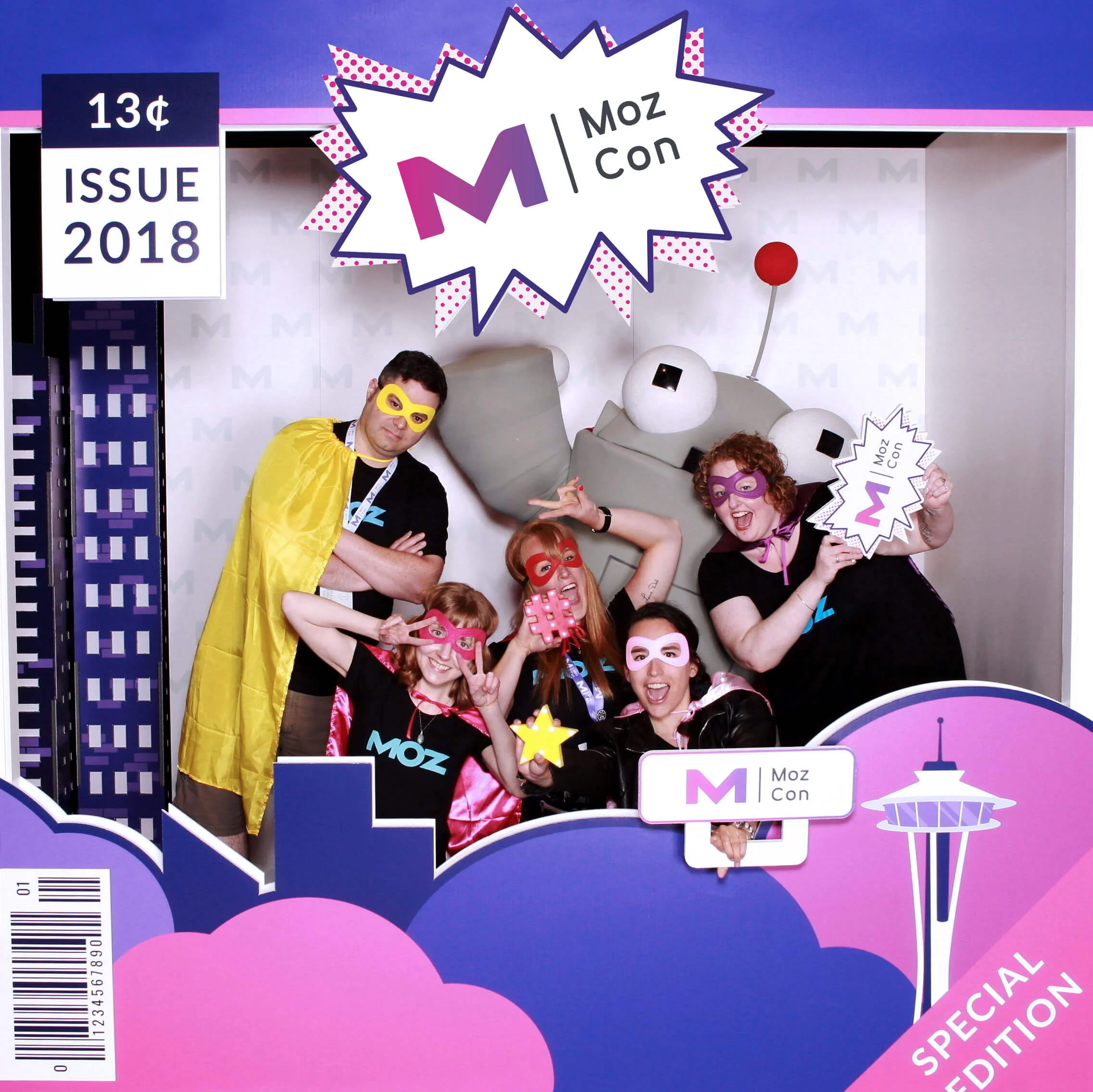 The Moz Design Team having some fun with Super Roger in the comic book-themed photo booth. Photo booth design by me, and photo booth executed with the help of SnapBar.
