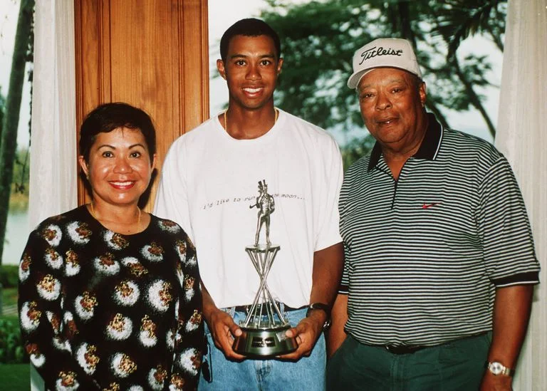 tiger-woods-1998-parents-lg-57bca3955f9b58cdfda5071c.jpg
