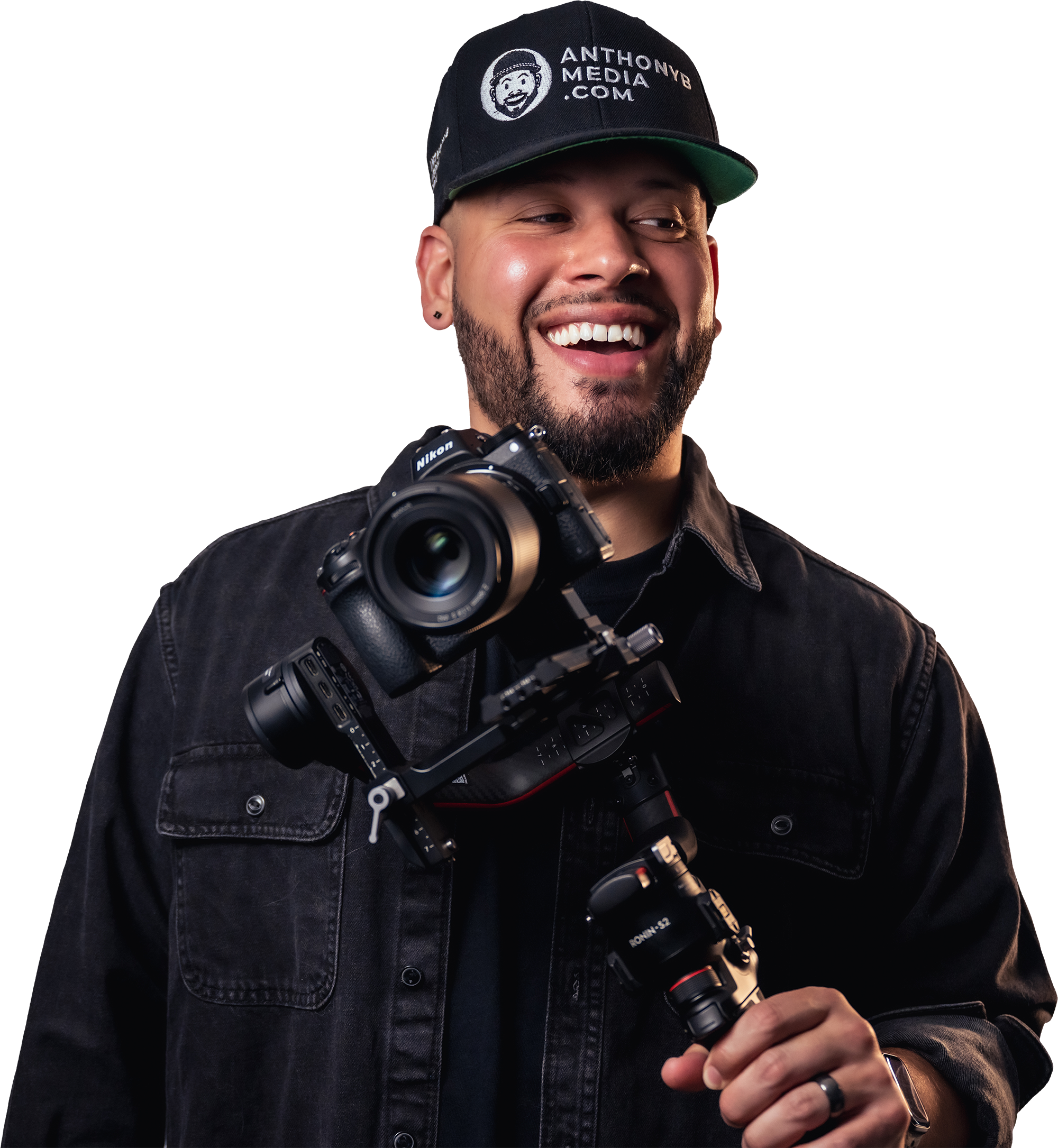 Anthony B Media owner holding a professional camera and stabilizer for business video production in Metro Detroit.