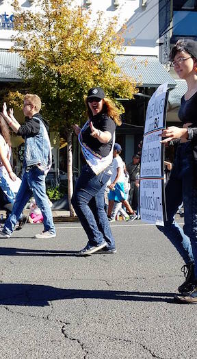 Kaylee Walker as Grand Marshal
