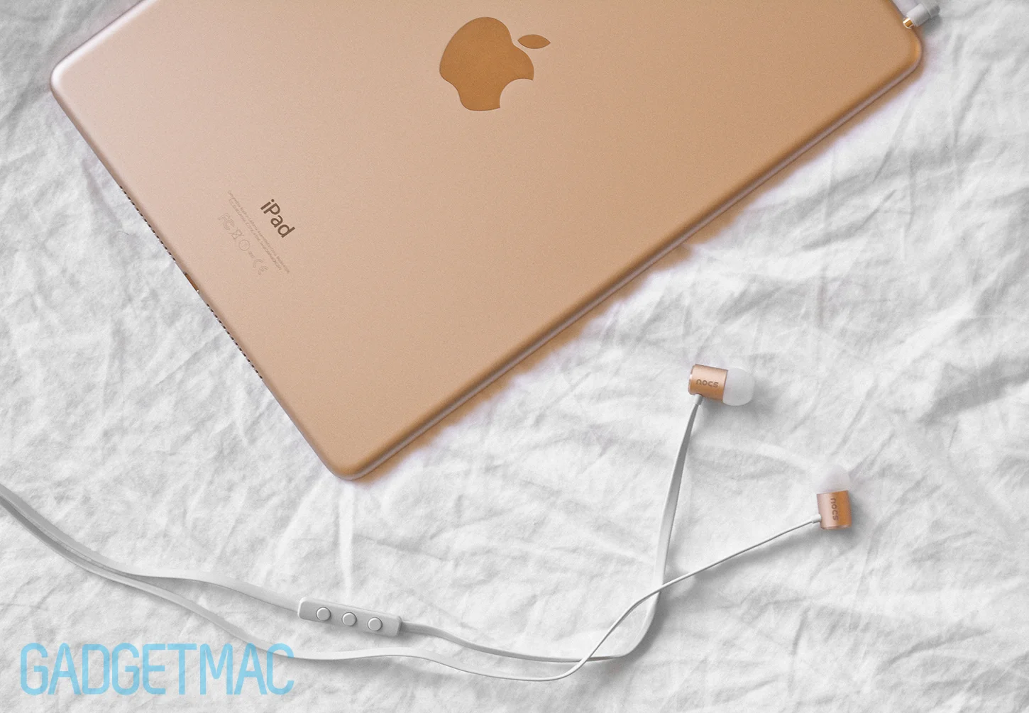nocs-ns500-in-gold-in-ear-headphones-with-ipad-air-2.jpg