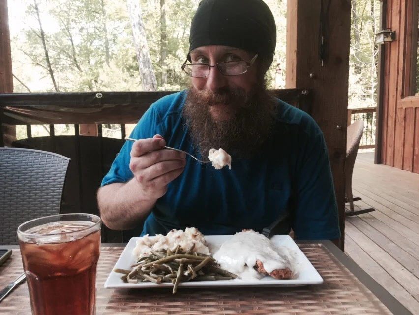 NoKey enjoying fried chicken with some iced tea!