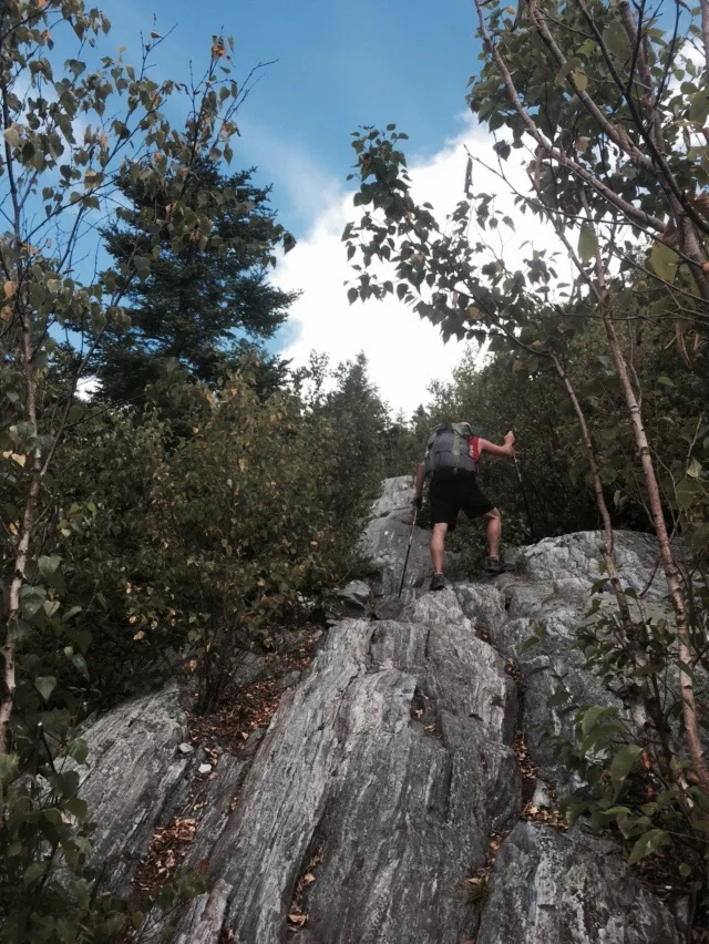 NoKey climbing Baker Peak.