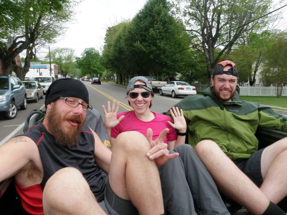 Hikers in the back of a truck, enjoying the free ride!