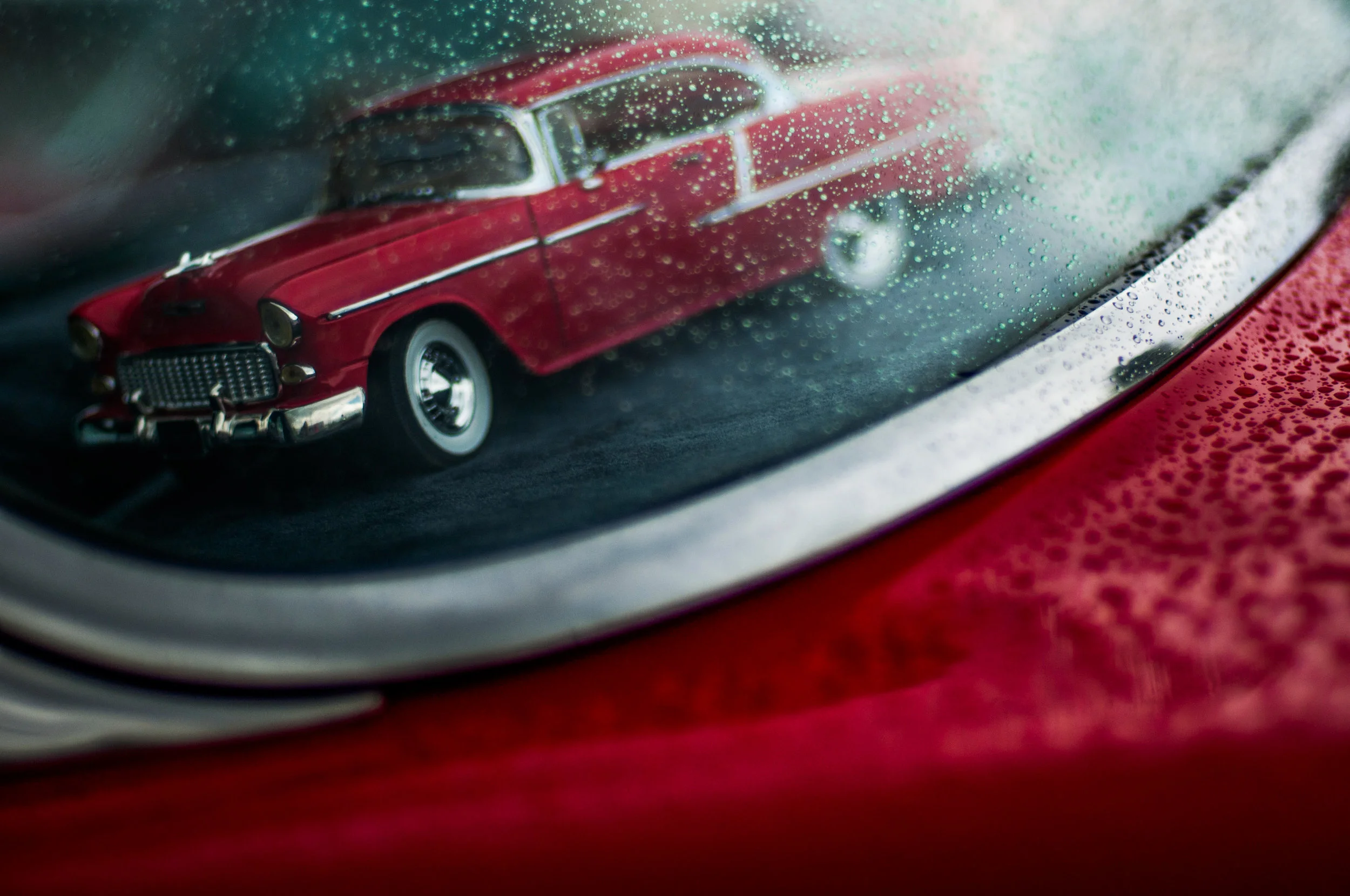A miniature 1955 Chevrolet Bel Air sits in the window of Denny Vowell's 1955 Custom Chevrolet Bel Air during the Mount Morris Tune Up event on Saturday, Aug. 13, 2016 in Mount Morris. The final tune up event offered an opportunity for the community to view a variety of classic cars on display before Back to the Bricks week.
