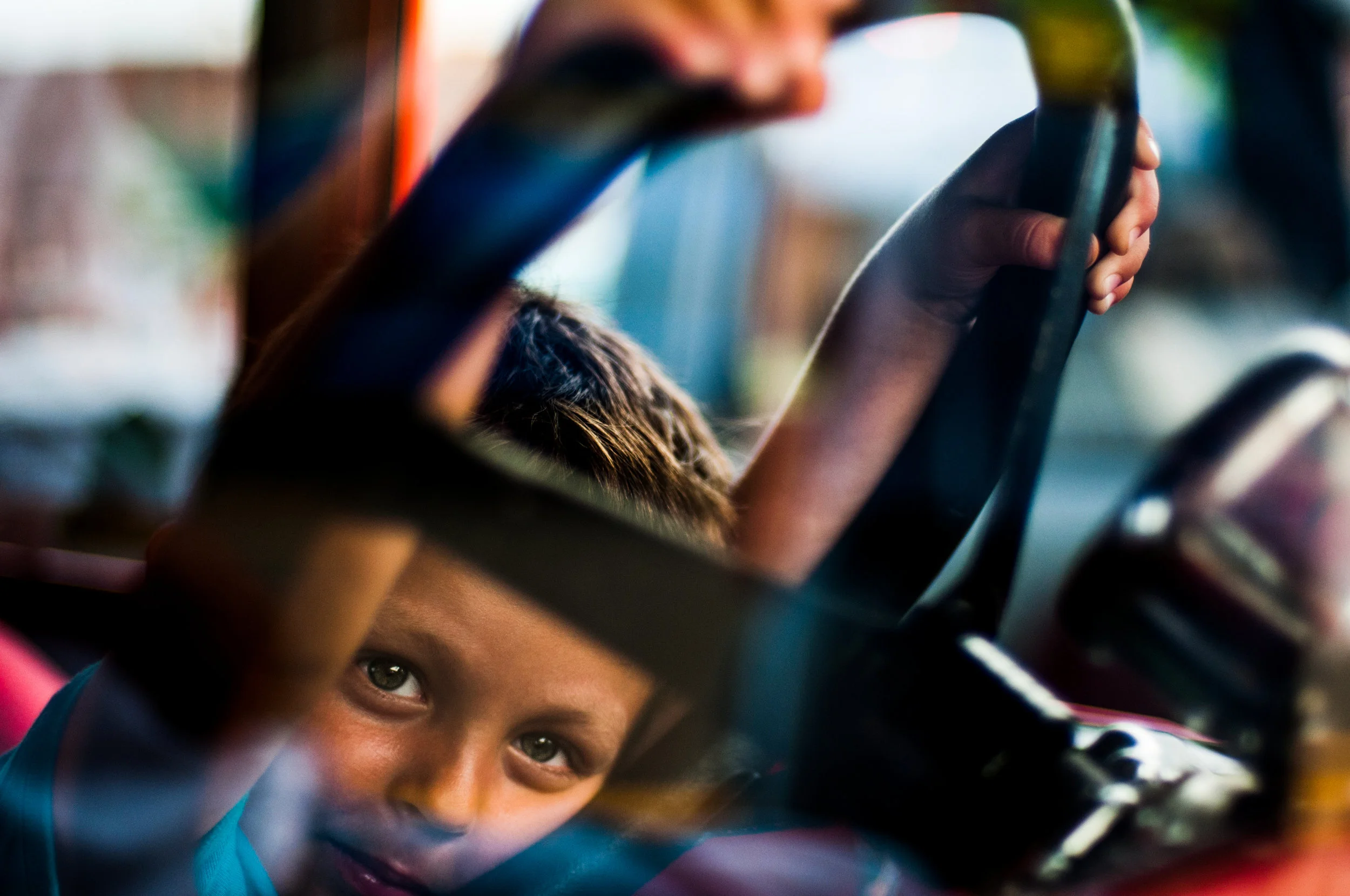 Xavier Weiss, 4, of Fenton, sits behind the steering wheel of his Uncle Stan's 1930 Model A Hot Rod during the Back to the Bricks Tune Up event on Thursday, Aug. 11, 2016 in downtown Fenton. 