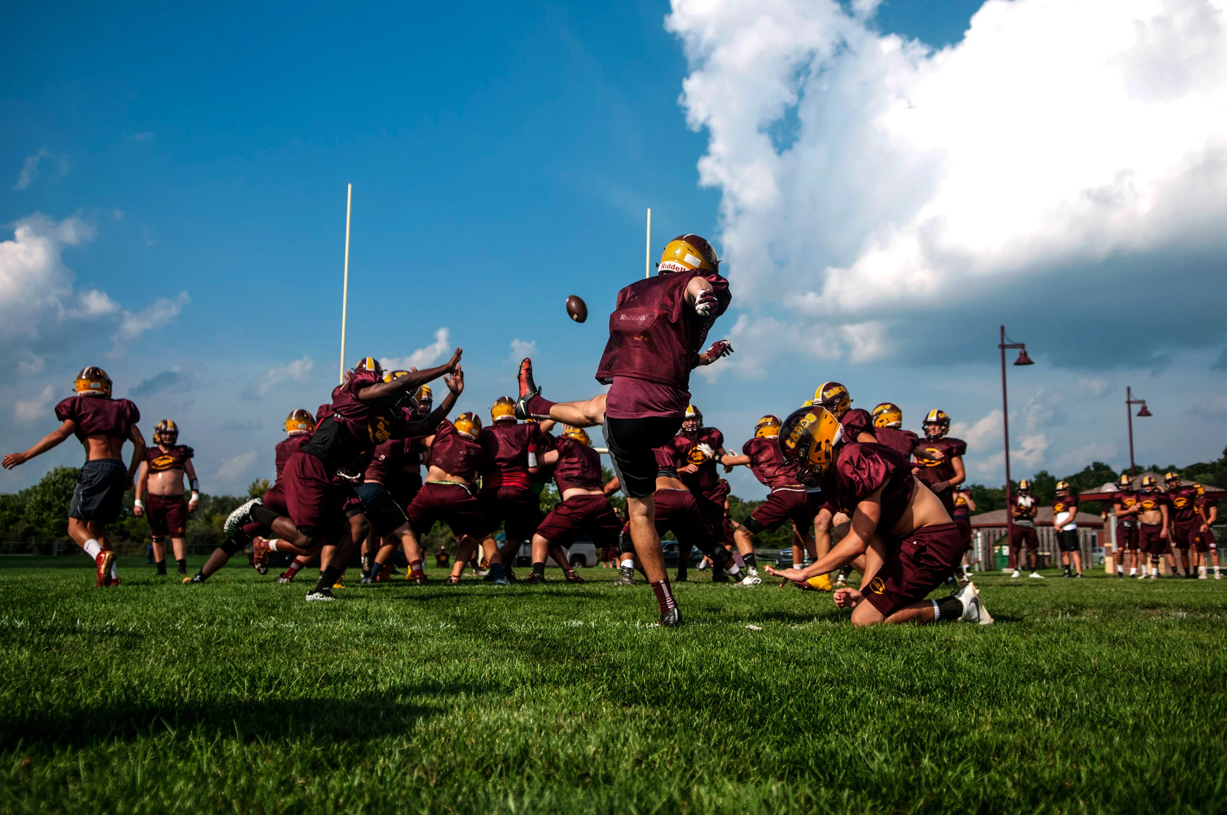 Davison High School players practice plays during their football workout on Tuesday, Sept. 6, 2016 in Davison. 