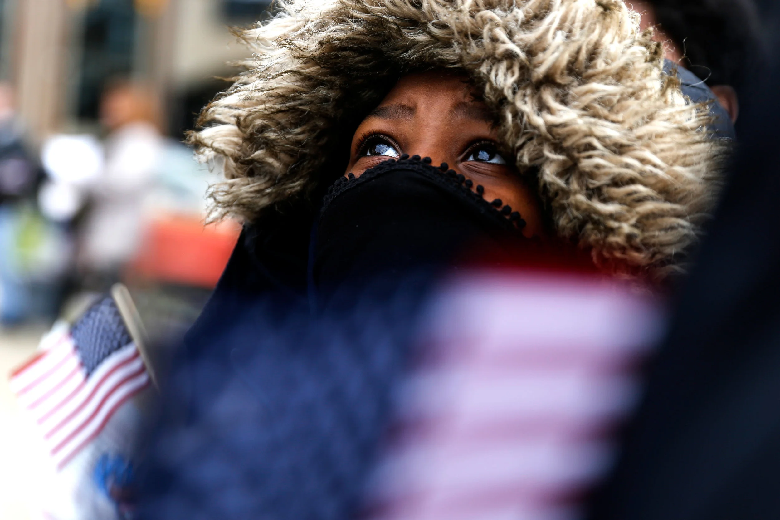 Ariyal Mays, 10, of Flint, attends a Veterans Day Salute with her class from Doyle-Ryder School to honor veterans and their service on Friday, Nov. 11, 2016 at McFarlan Veterans Memorial Park in downtown Flint. "Veterans Day...is a day where we get to celebrate people who served for us, and people who cares about people's family and like to keep America free," Mays said. "All these veterans around me are just like my family members."