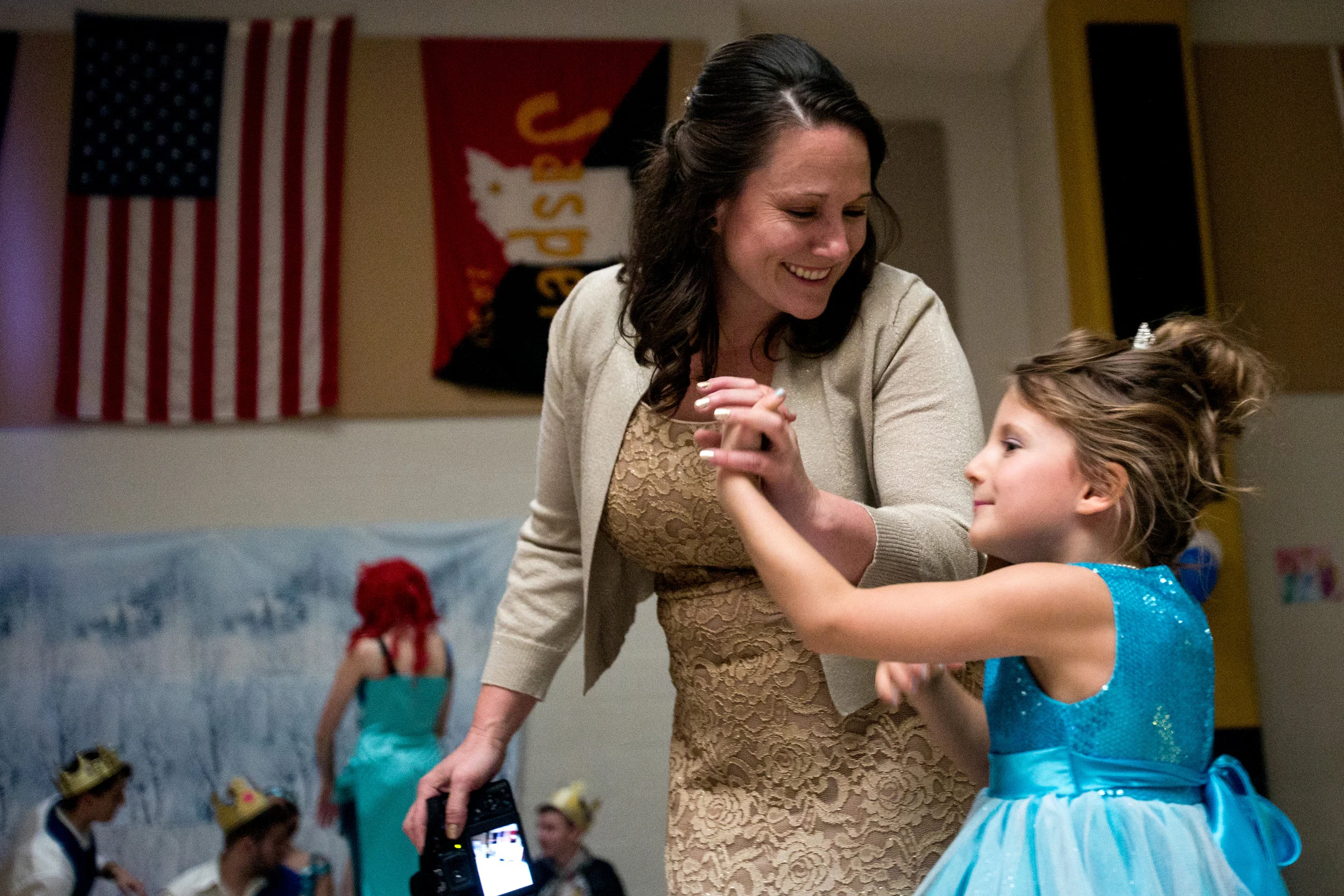 Mya Uebelhor of Huntingburg, 7, danced with her mother Sherri during Sunday afternoon’s Grand Ball at Jasper Middle School. Northwood Retirement Community hosted the enchanted event where children dressed up and were taught to act and dance like princes and princesses.
