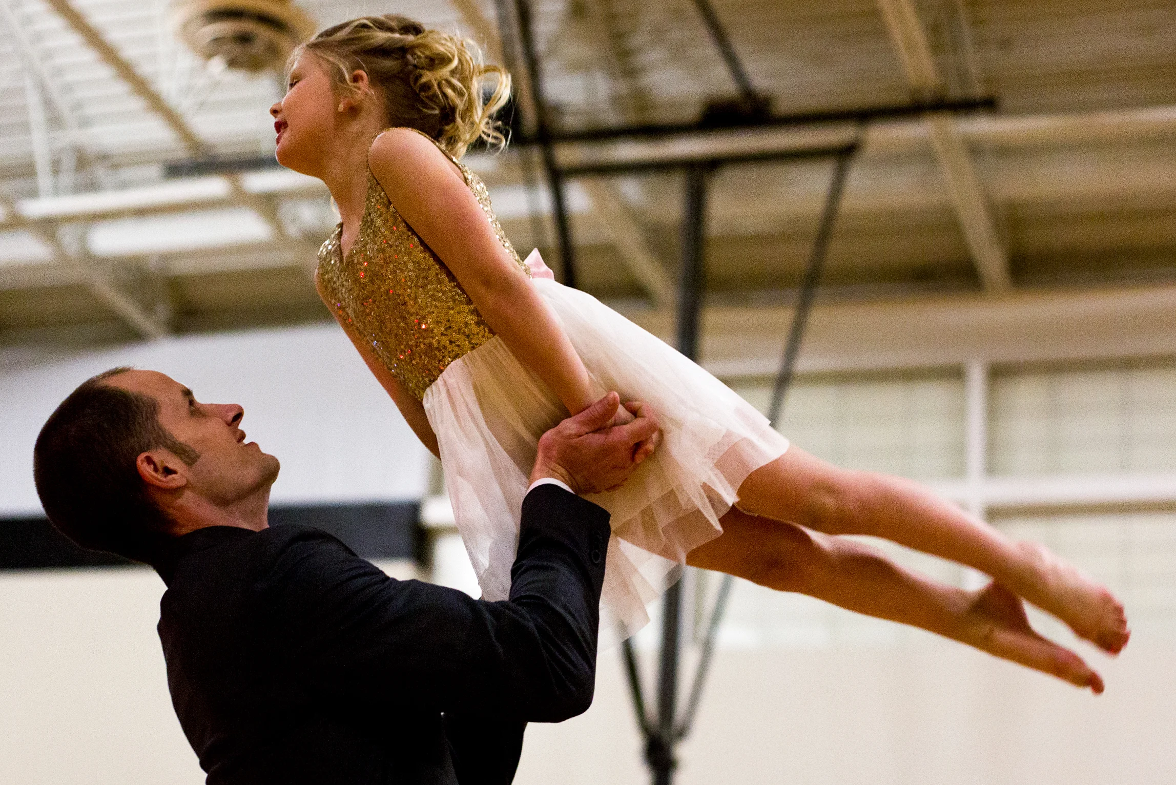 Rick Lyon of Jasper lifted his daughter, Sterling, 6, into the air while dancing during the second annual Daddy and Daughter Dance on Saturday evening at Jasper Middle School. Dance Central Academy’s parent club sponsored the event that attracted more than 300 people.