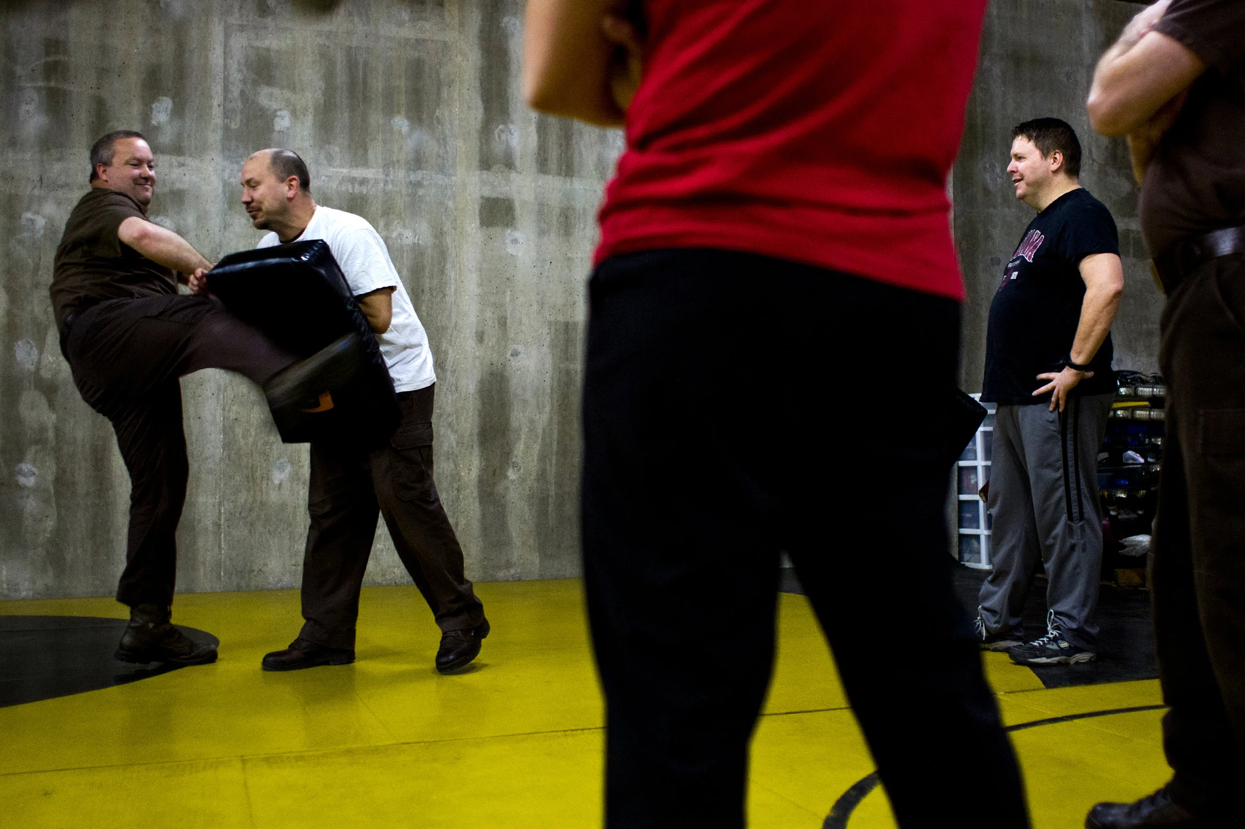 Dubois County Security Center jail officer Toby Oser, left, and Dubois County Sheriff’s Department Deputy Wade Pierce demonstrated different defensive tactics during training Thursday afternoon at the security center in Jasper. The session was part of two days of defensive tactics training for local officers. Pierce said the department usually has four to six training events a year.