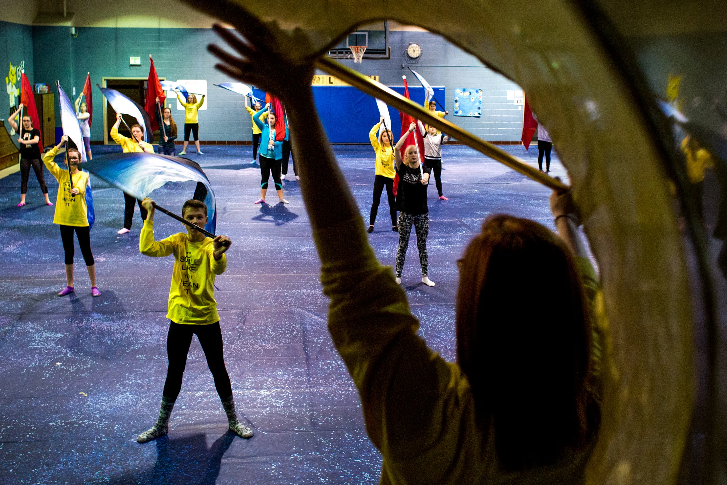 Color guard instructor Amanda Blunk demonstrated twirling techniques during a color guard clinic on Saturday at Fifth Street Elementary School gym in Jasper. Jasper High School color guard instructor Alie White offered the first clinic for middle and high school youth to learn basic skills and to see if they would enjoy being in guard.