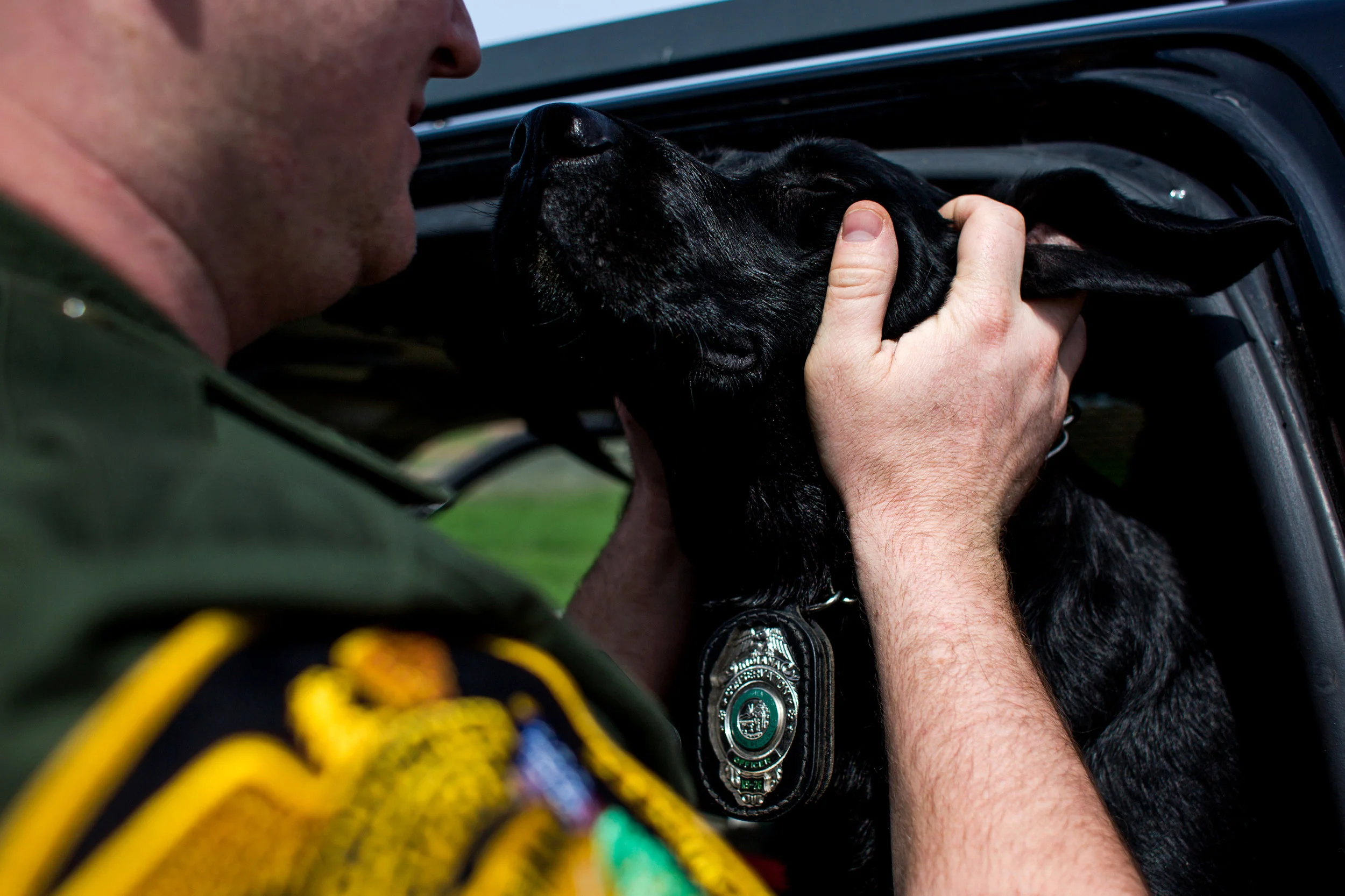 Indiana Conservation Officer Tim Kaiser praised his K-9 partner, Derby, after tracking two fisherman at the Blue Grass Fish and Wildlife Area during a drill on March 8. Kaiser said he likes to take Derby to places where he can simulate real-life tracking experiences.