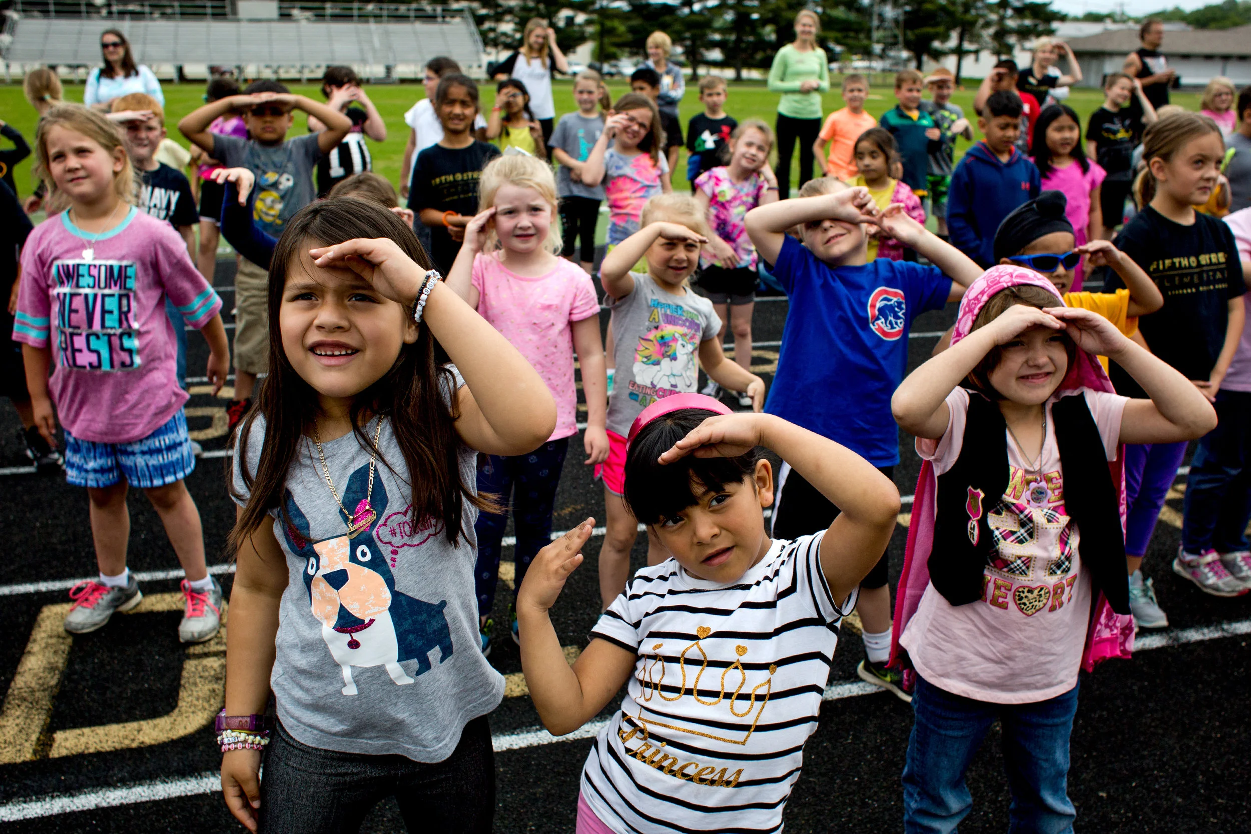 Fifth Street School kindergartners Samantha Escobar DeRenteria, left, Karina Salas Rodriguez and Ariel Page broke out their best moves Friday during a Zumba class as part of the closing ceremony of the Jasper school’s annual Whiskers Walk. Families joined students throughout the day for the walk-a-thon around the track next door at Jerry Brewer Alumni Stadium. 