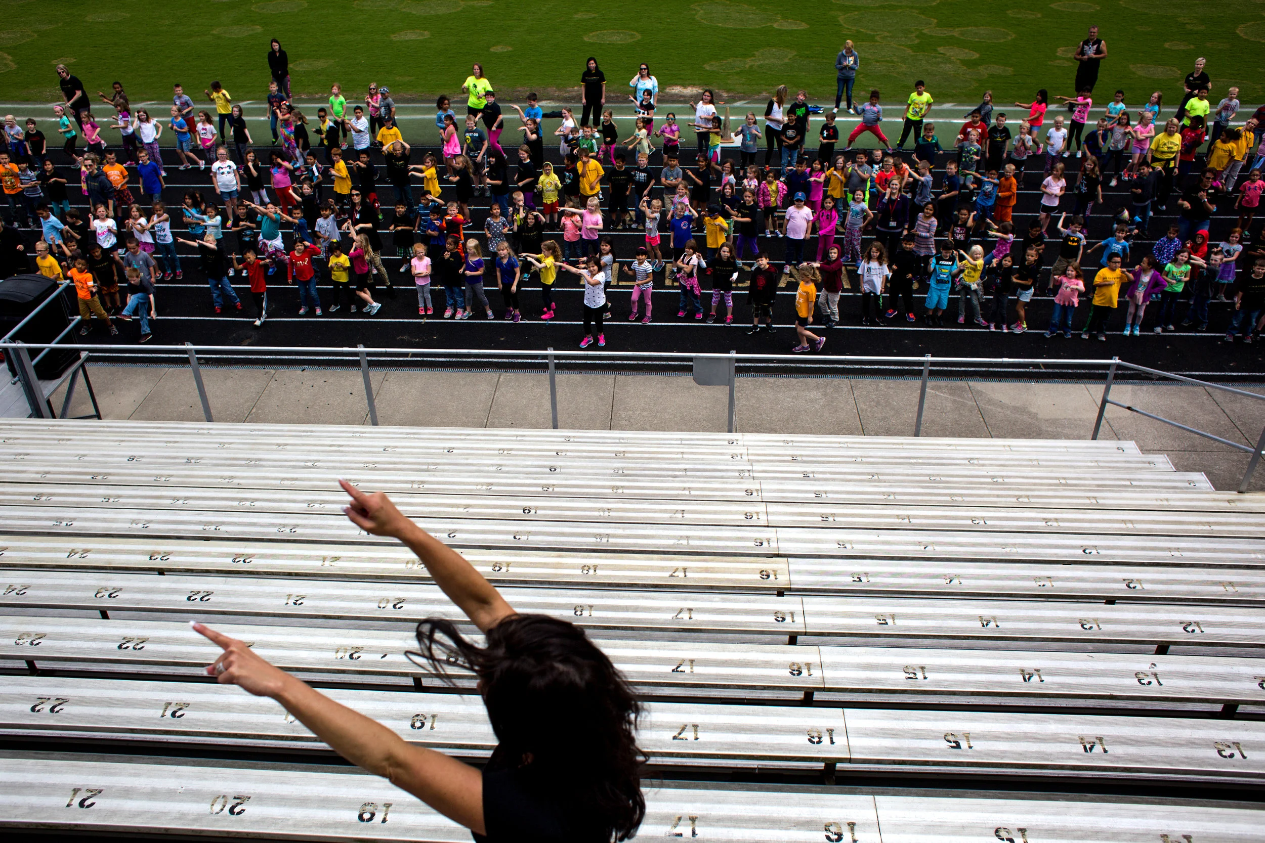 Jasper Middle School health teacher Jill Wigand led the students of Fifth Street School through a Zumba class as part of the closing ceremony of the Jasper school’s annual Whiskers Walk. 