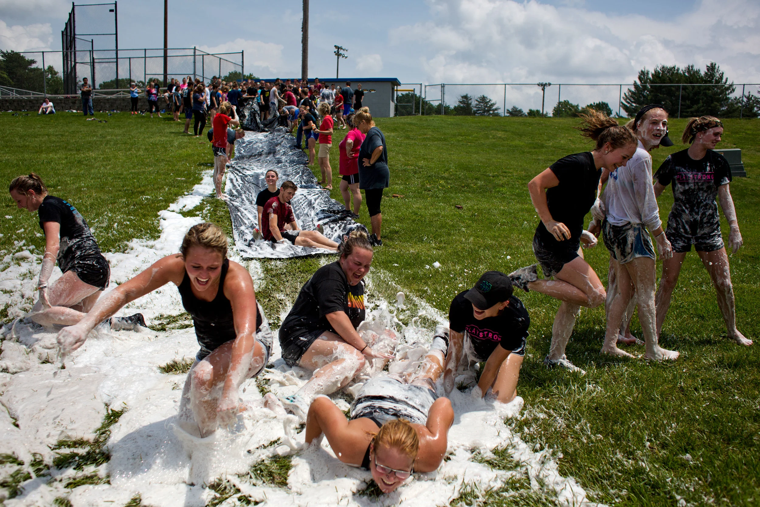 Northeast Dubois High School students took turns sliding down a giant slip-and-side during Friday’s fun day at the school in Dubois. The student council sponsored the Amazing Race-style event to help students relax before final exams. Students divided into groups to participate in events, including the slip-and-slide positioned on a hill descending from the baseball field. Classes in all five local school districts end this week.
