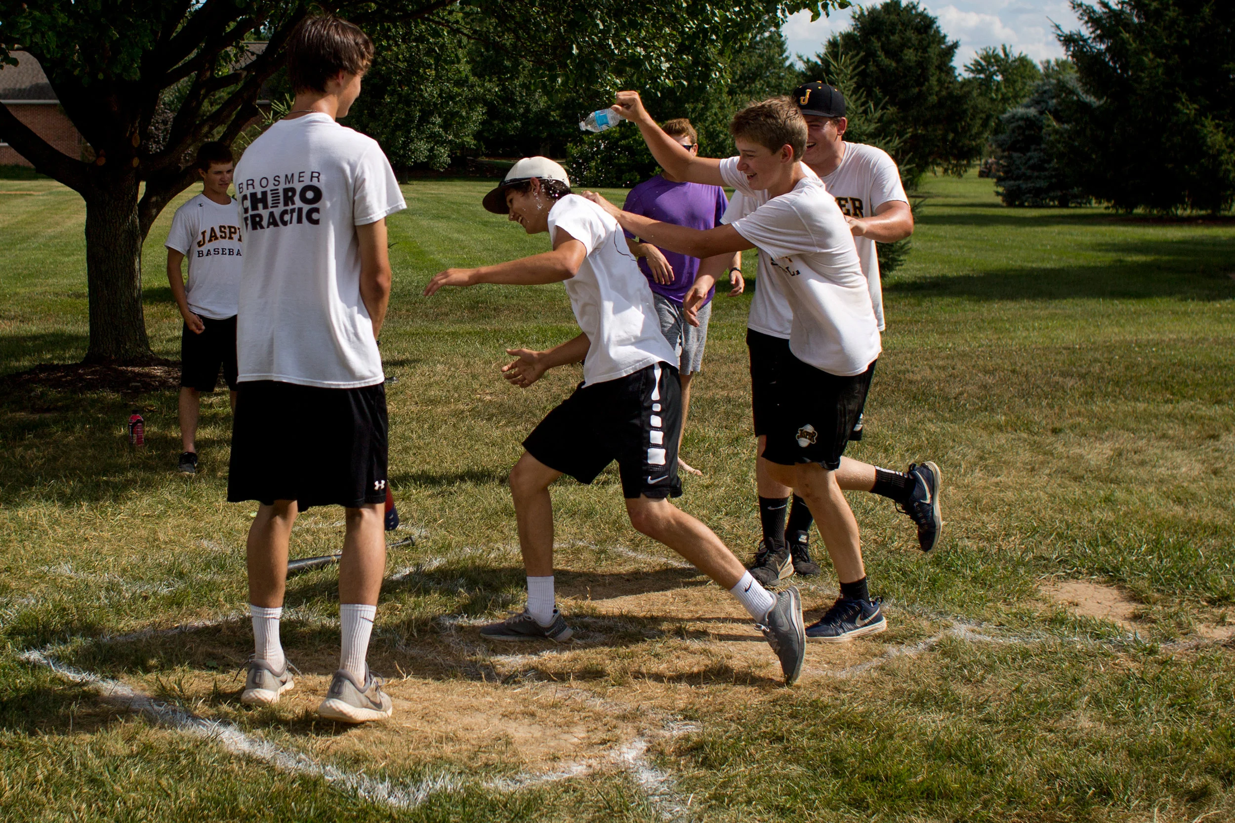Teammates congratulated Jasper High School baseball player Josh Weidenbenner after the sophomore smacked a home run while playing whiffle ball at the home of teammate Tanner Egbert on Tuesday afternoon in Ireland. Several of Jasper’s players have been engaging in whiffle ball battles in Egbert’s backyard diamond for years. The Egberts said they enjoy creating ways for the players to bond in a more relaxed setting. Tanner is a senior on this year’s team, but the family is open to extending the tradition even after Tanner’s career ends. The Wildcats will play South Bend St. Joseph in the Class 3A state finals at 2 p.m. Saturday at Victory Field in Indianapolis. A send-off is set for 1 p.m. Friday in the parking lot of The Home Depot on Jasper’s north side.