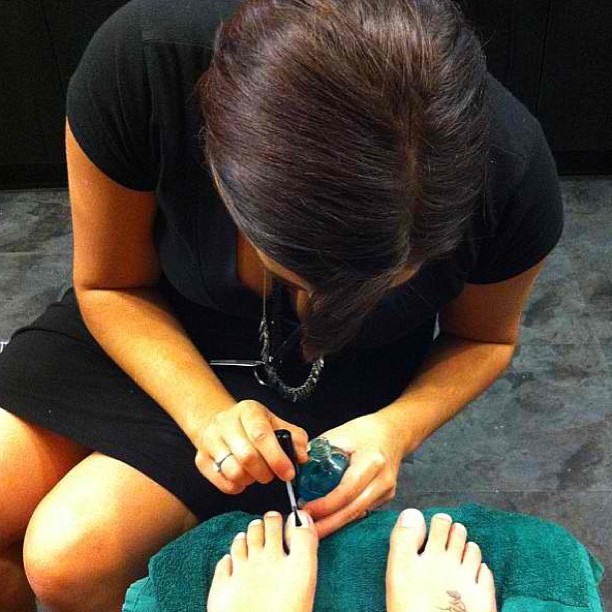 This is a real life- unglamorous- photo of my giving my BFF a pedicure when I was in cosmetology school, you're welcome.