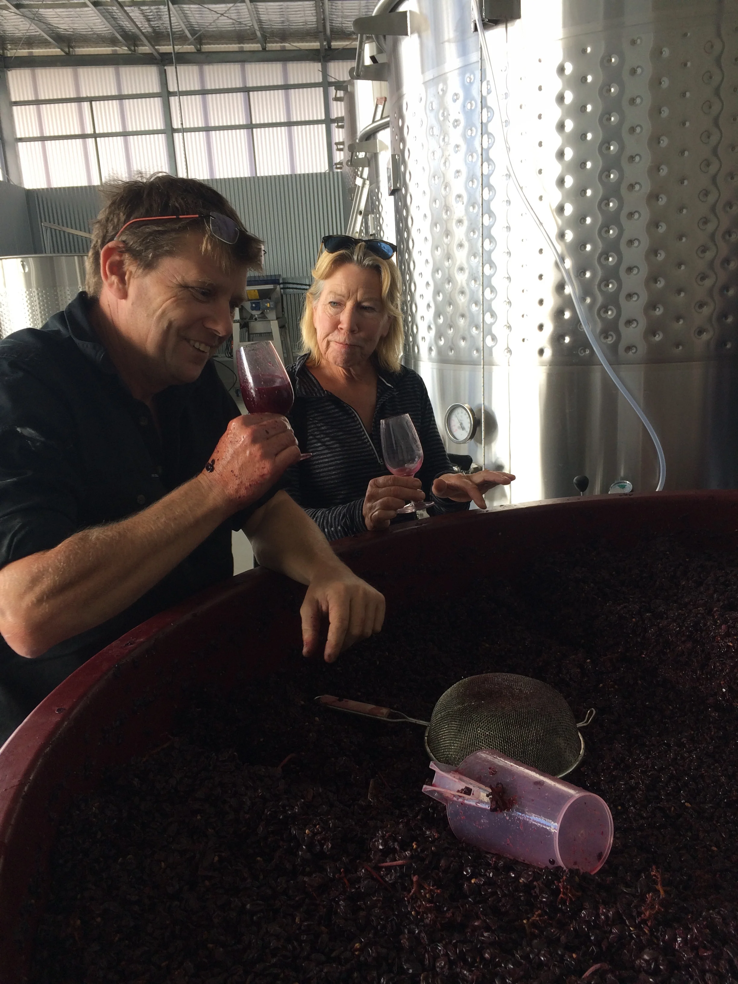 The viticulturist and the winemaker. Sheena and Julian taste the Native Point pinot noir ferment. 
