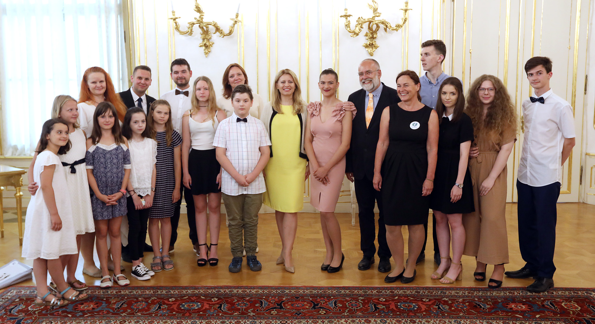 The international winners, their teachers, YRE Slovakia team, and the President in the middle (yellow dress) Photo credit for the photo Marián Garaj (the Office of the President)
