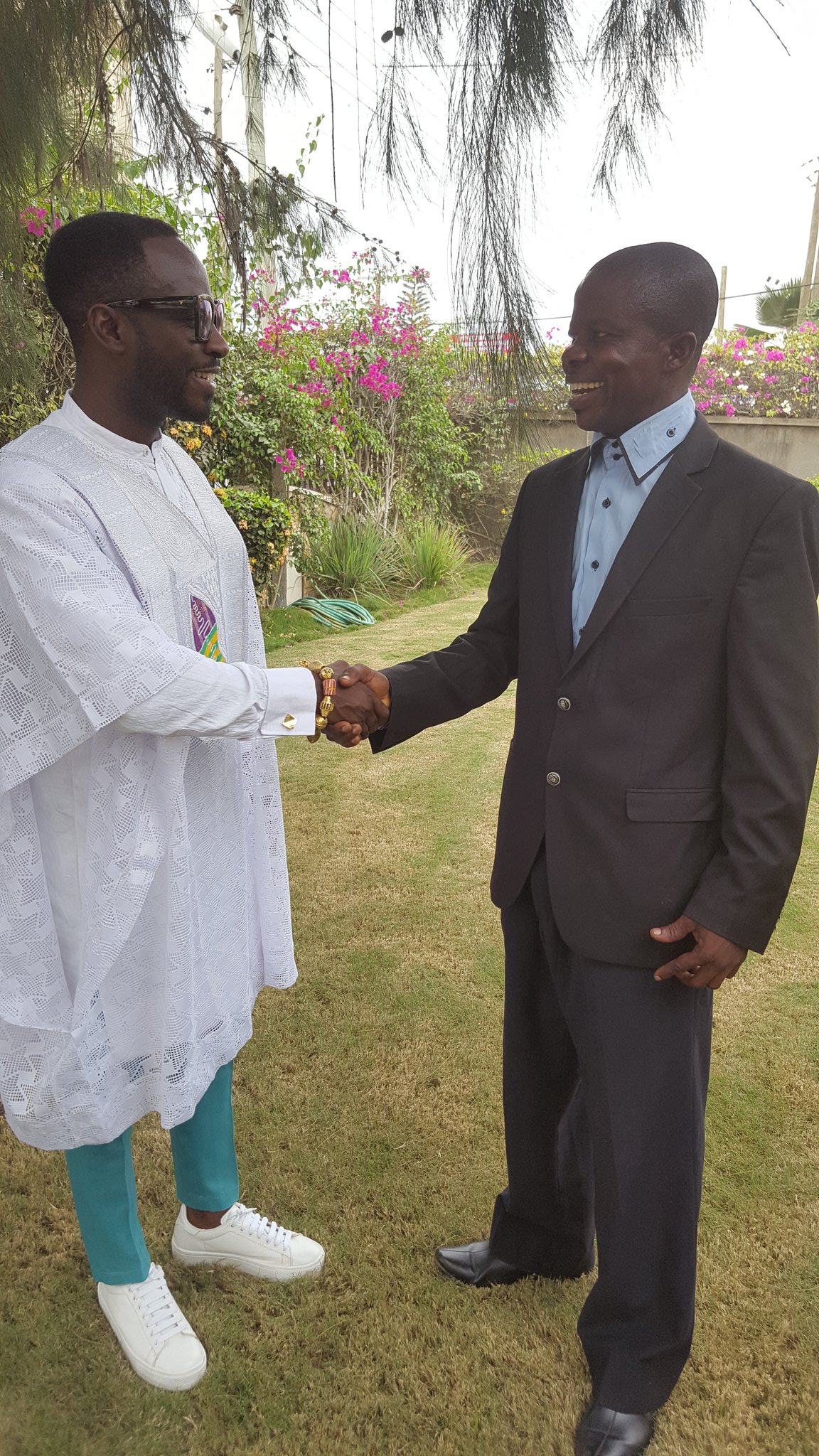  Ghanaian musician Okyeame Kwame (left) being greeted by DGM Ghana National Steering Committee Chairman Hayford Duodu (right); Credit: Hayford Duodu, DGM Ghana 