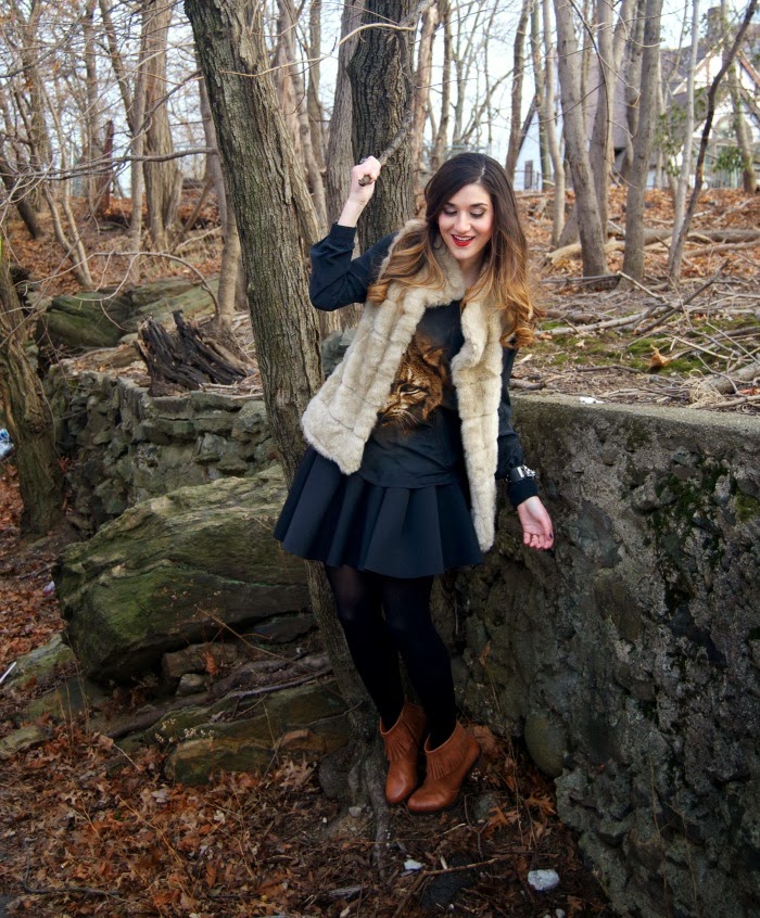 panther top, fur vest, and fringe booties - Louboutins and Love Fashion Blog