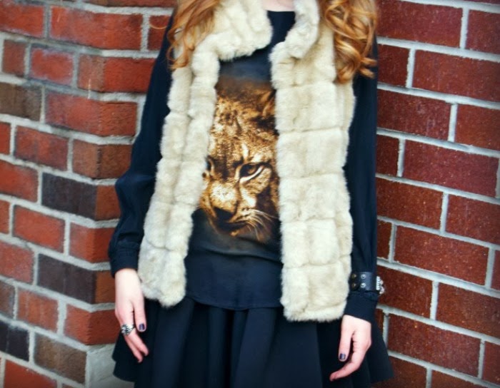 panther top, fur vest, and fringe booties - Louboutins and Love Fashion Blog