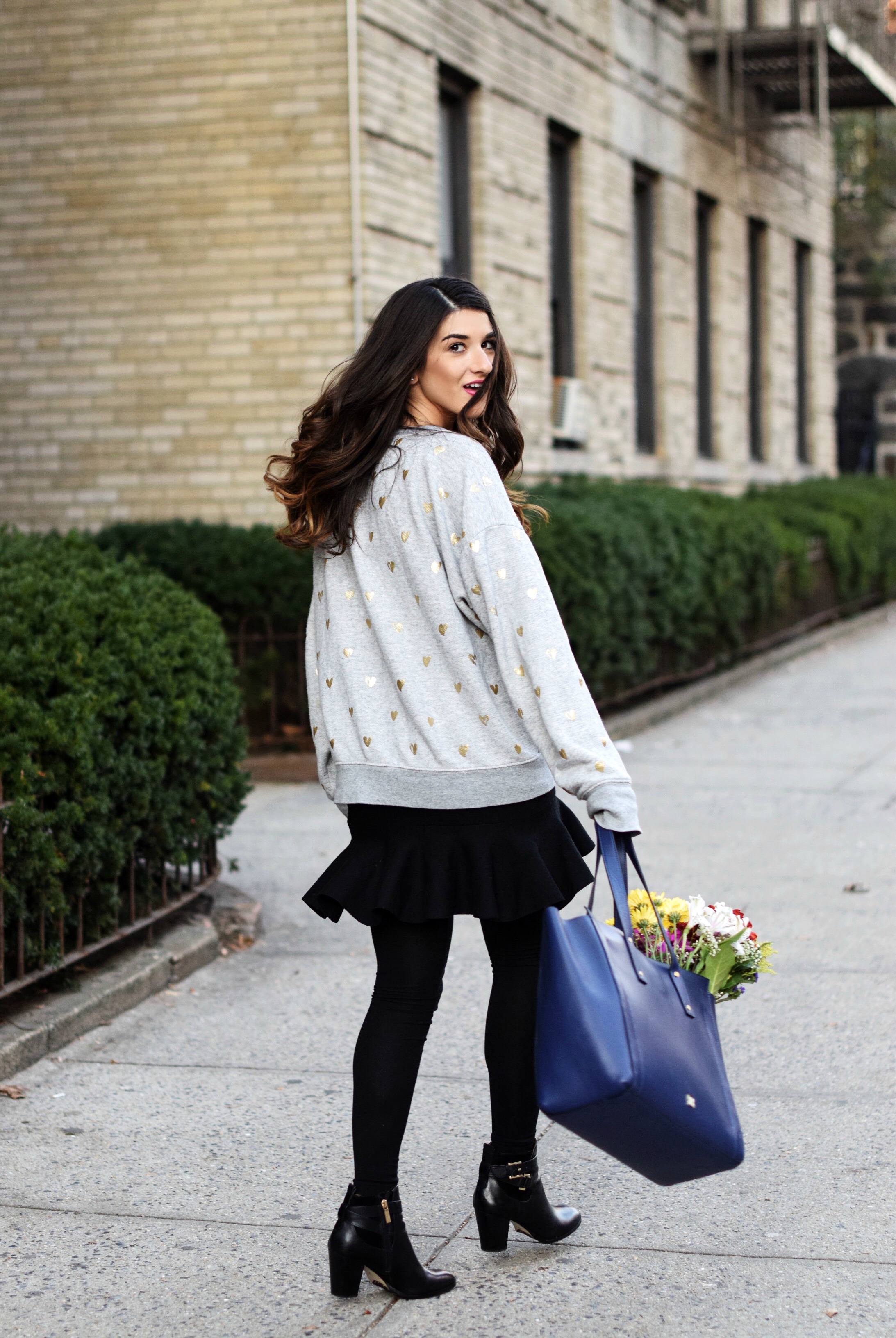 Oversized Sweatshirt Ivanka Trump Soho Tote Louboutins & Love Fashion Blog Esther Santer NYC Street Style Blogger Nordstrom Black Booties Blue Bag Pocketbook Purse Shopping What To Wear Jcrew Winter Inspo Model Girl Photoshoot Hairstyle Skirt Flowers.jpg