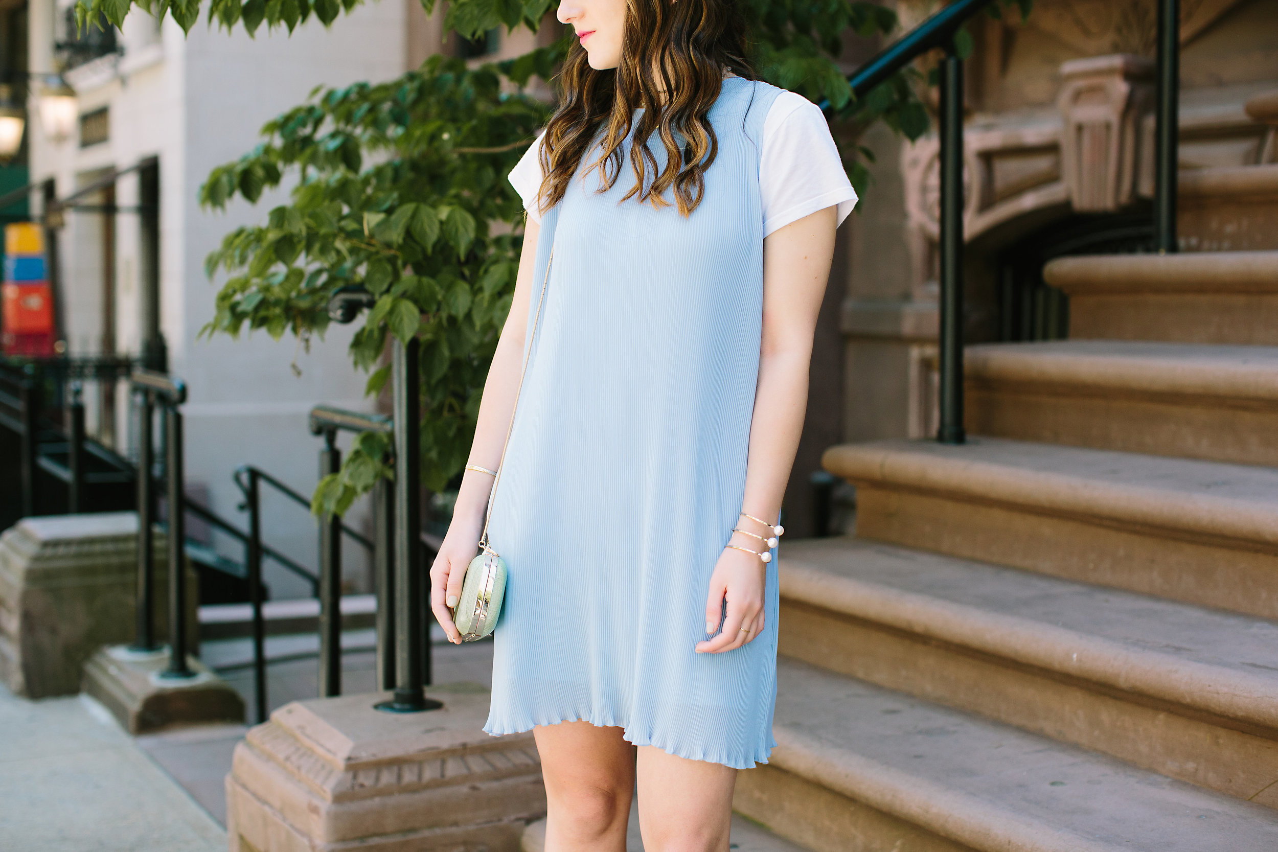 Pastel Blue Pleated Dress Keepsake The Label Louboutins & Love Fashion Blog Esther Santer NYC Street Style Blogger Outfit OOTD Pretty Photoshoot Upper East Side Dolce Vita Wedges Gold Jewelry Club Monaco Clutch White Women Tee Shirt Inspo Summer Look.jpg