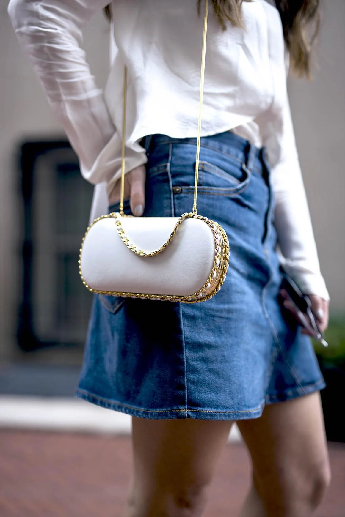 White Silk Top Chelsea and Walker Louboutins & Love Fashion Blog Esther Santer NYC Street Style Blogger Outfit OOTD Trendy Jean Denim Skirt Zara Clutch Bag Erin Dana Gold Chain Ivanka Trump Fringe Booties TeamIvanka Women Girl Transitional Pieces Fall.jpg