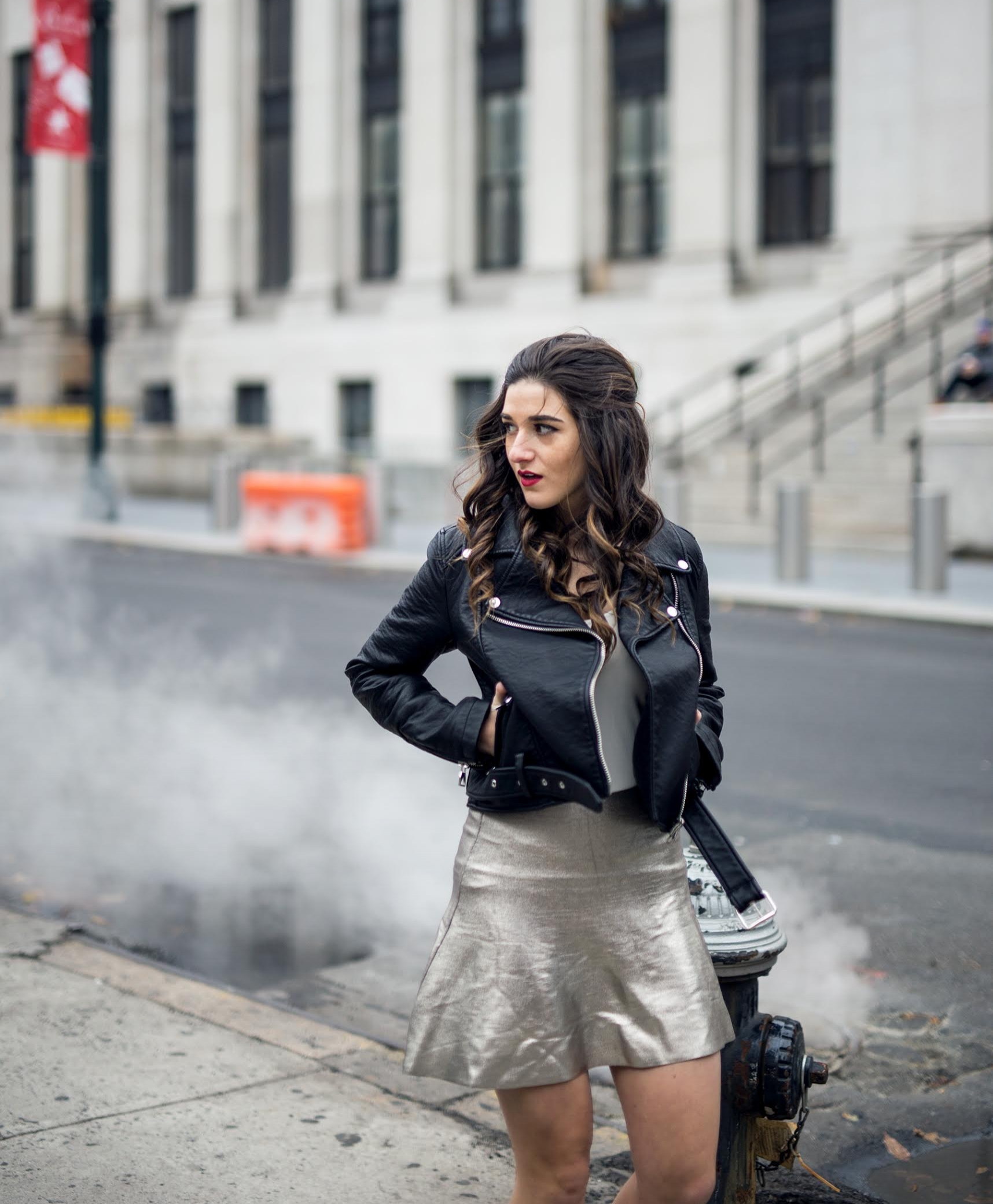 Feminine Edgy Look For The Holidays Payless Louboutins & Love Fashion Blog Esther Santer NYC Street Style Blogger Outfit OOTD Trendy Metallic Skirt Black Moto Leather Jacket Girly Lace-Up Heels Hair Shopping Women Pretty Party Shoes Photoshoot Model.jpg