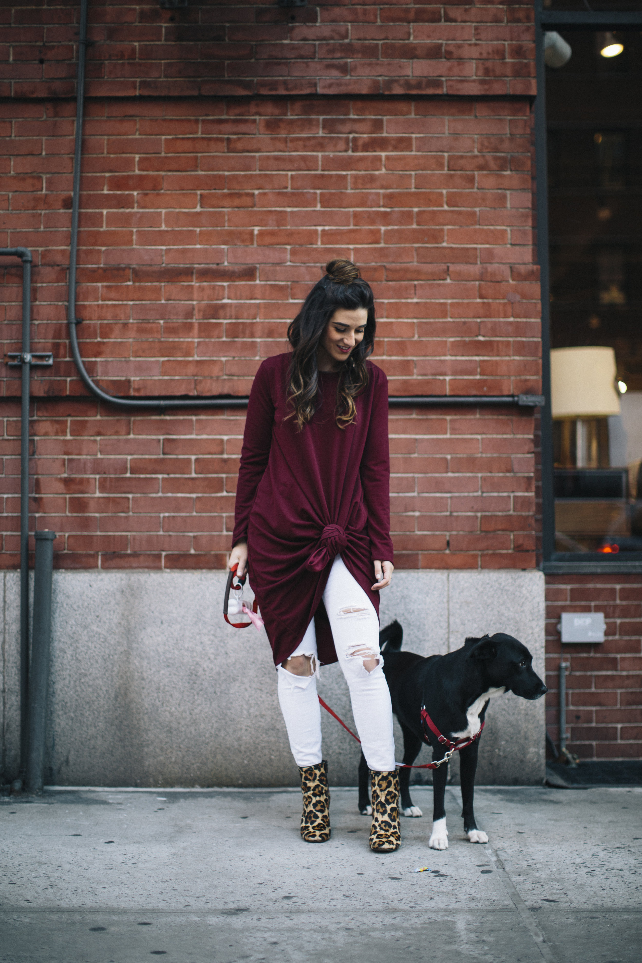 Knotted Dress + Ripped White Jeans 4 Ways To Build Connections Louboutins & Love Fashion Blog Esther Santer NYC Street Style Blogger Outfit OOTD Trendy Red Maroon Burgundy Winter Color Leopard Coach Booties Pants Girl Women Bun Topknot Hair Shoes Wear.jpg