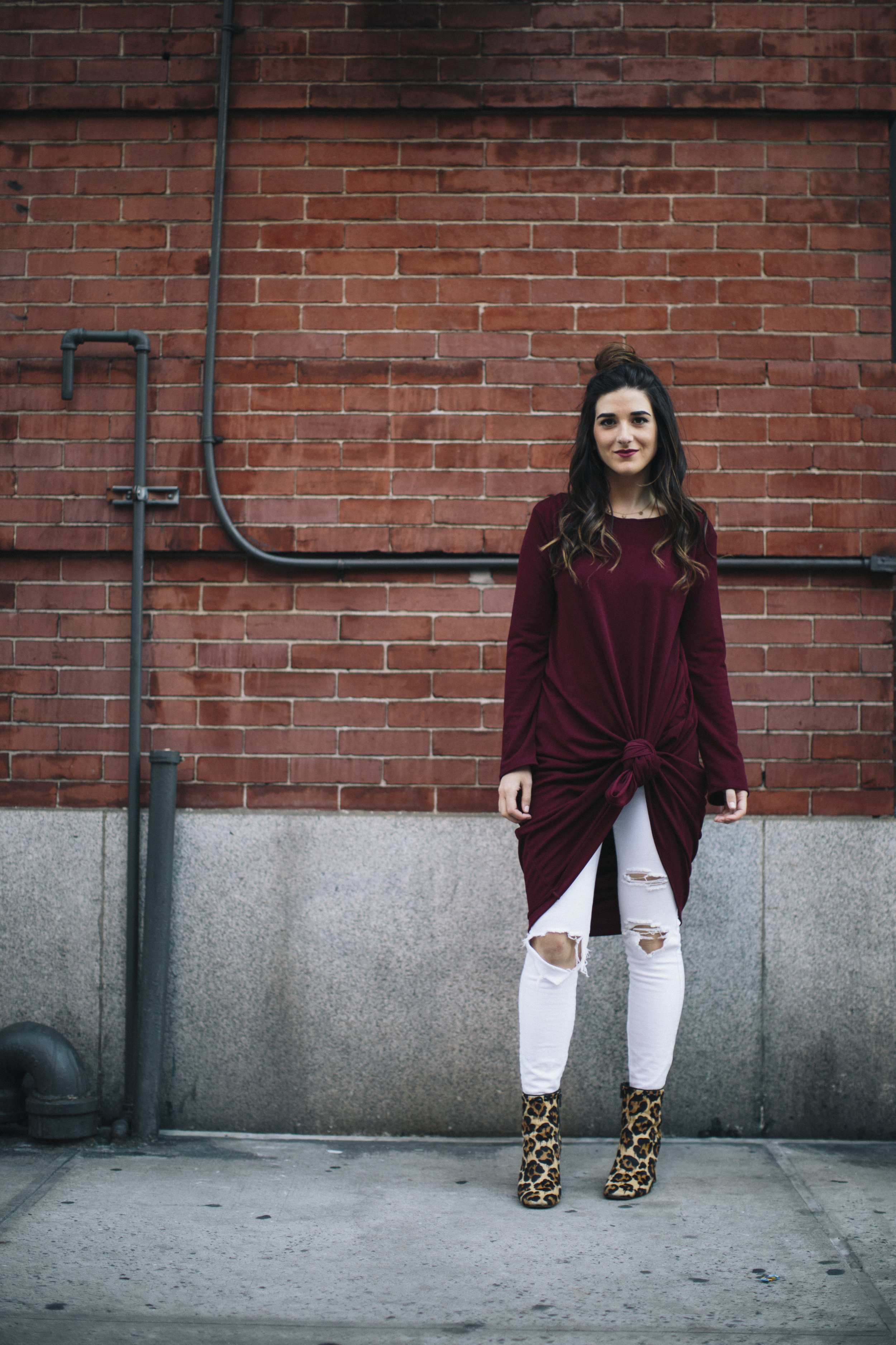 Knotted Dress + Ripped White Jeans 4 Ways To Build Connections Louboutins & Love Fashion Blog Esther Santer NYC Street Style Blogger Outfit OOTD Trendy Red Maroon Burgundy Winter Wear Color Leopard Coach Shoes Booties Pants Girl Women Topknot Bun Hair.jpg