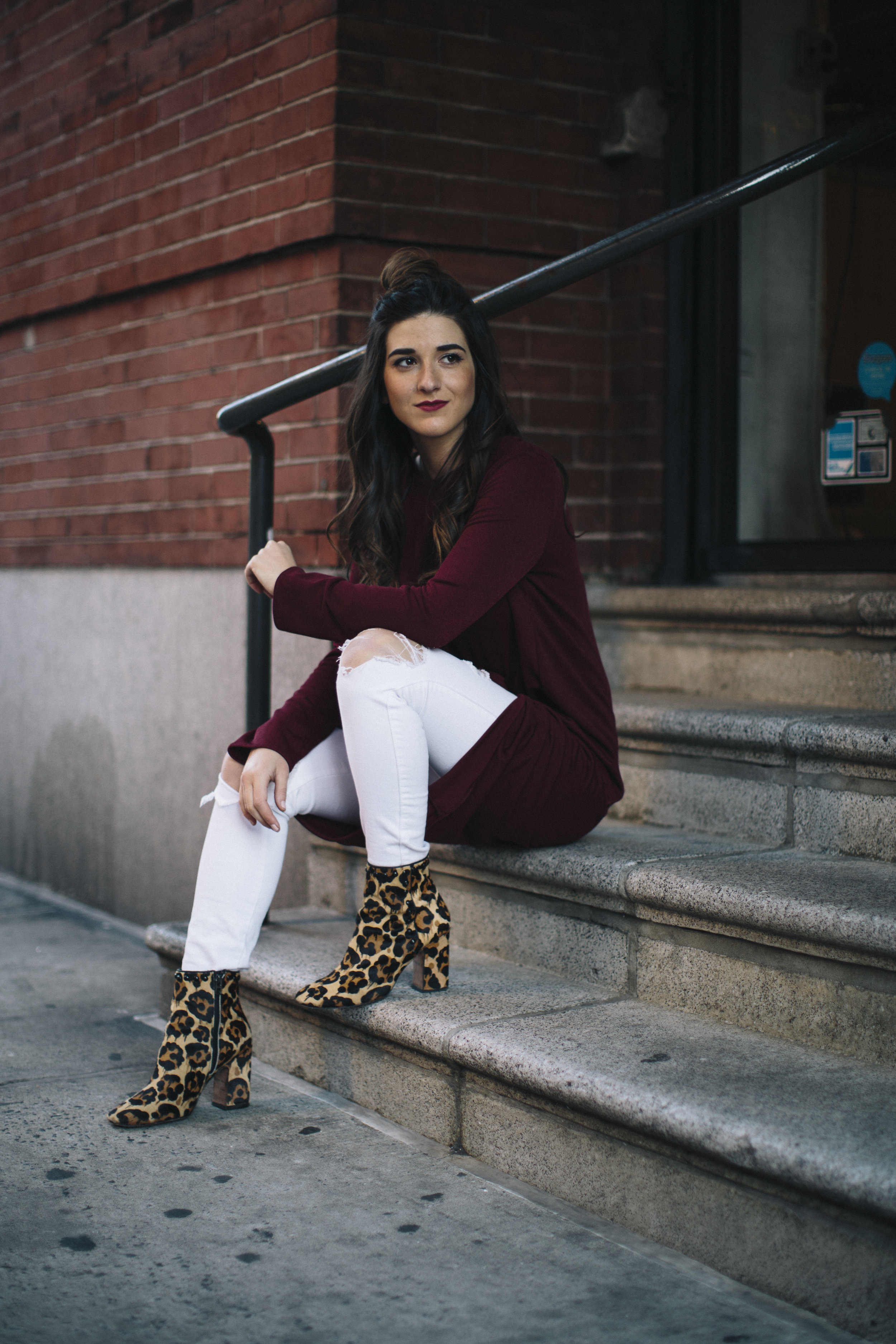 Knotted Dress + Ripped White Jeans 4 Ways To Build Connections Louboutins & Love Fashion Blog Esther Santer NYC Street Style Blogger Outfit OOTD Trendy Red Maroon Burgundy Winter Wear Color Leopard Coach Shoes Booties Pants Women Girl Topknot Bun Hair.jpg