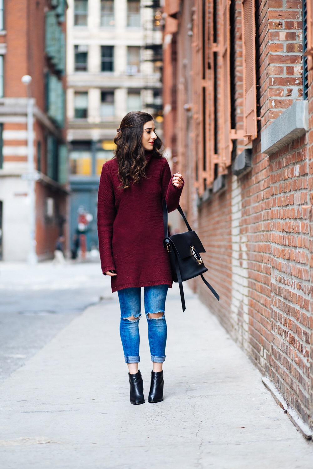 Maroon Sweater Dress Zac Posen Belay Bag 5 Tips On Balancing Work Blog And Social Life Esther Santer Fashion Blog NYC Street Style Blogger Outfit OOTD Trendy Girl Women Photoshoot Ripped Denim Jeans  Booties Hair Inspo Handbag  Purse Shoes Turtleneck.JPG