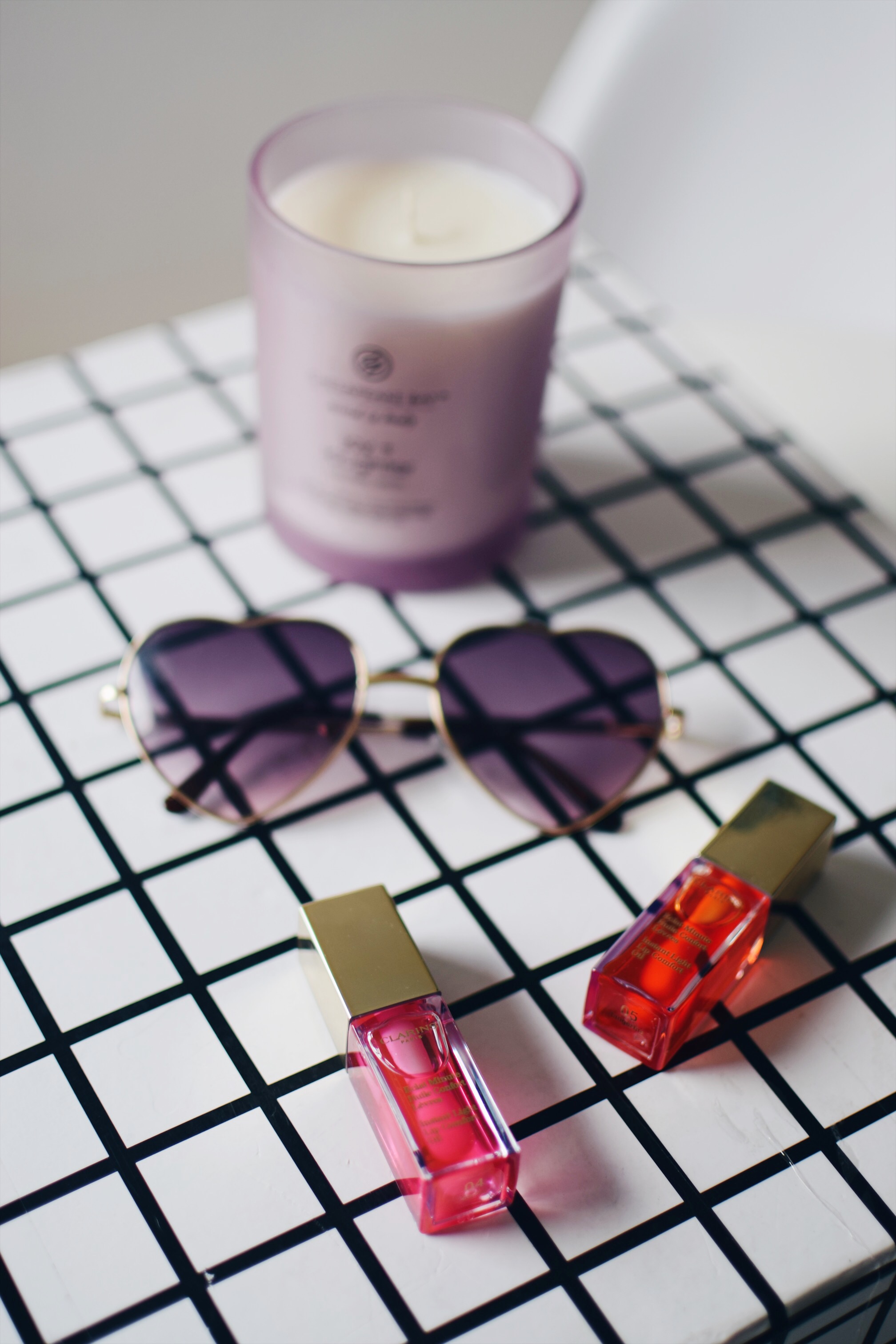 Softer Lips With Clarins Lip Oil Esther Santer Fashion Blog NYC Street Style Blogger Outfit OOTD Trendy Makeup Beauty Candle Flatlay Lipstick Color Shade Plumper Sunglasses Perfume Pretty Product Review  Shop Girl Women Orange Tangerine Pink Candy Buy.JPG