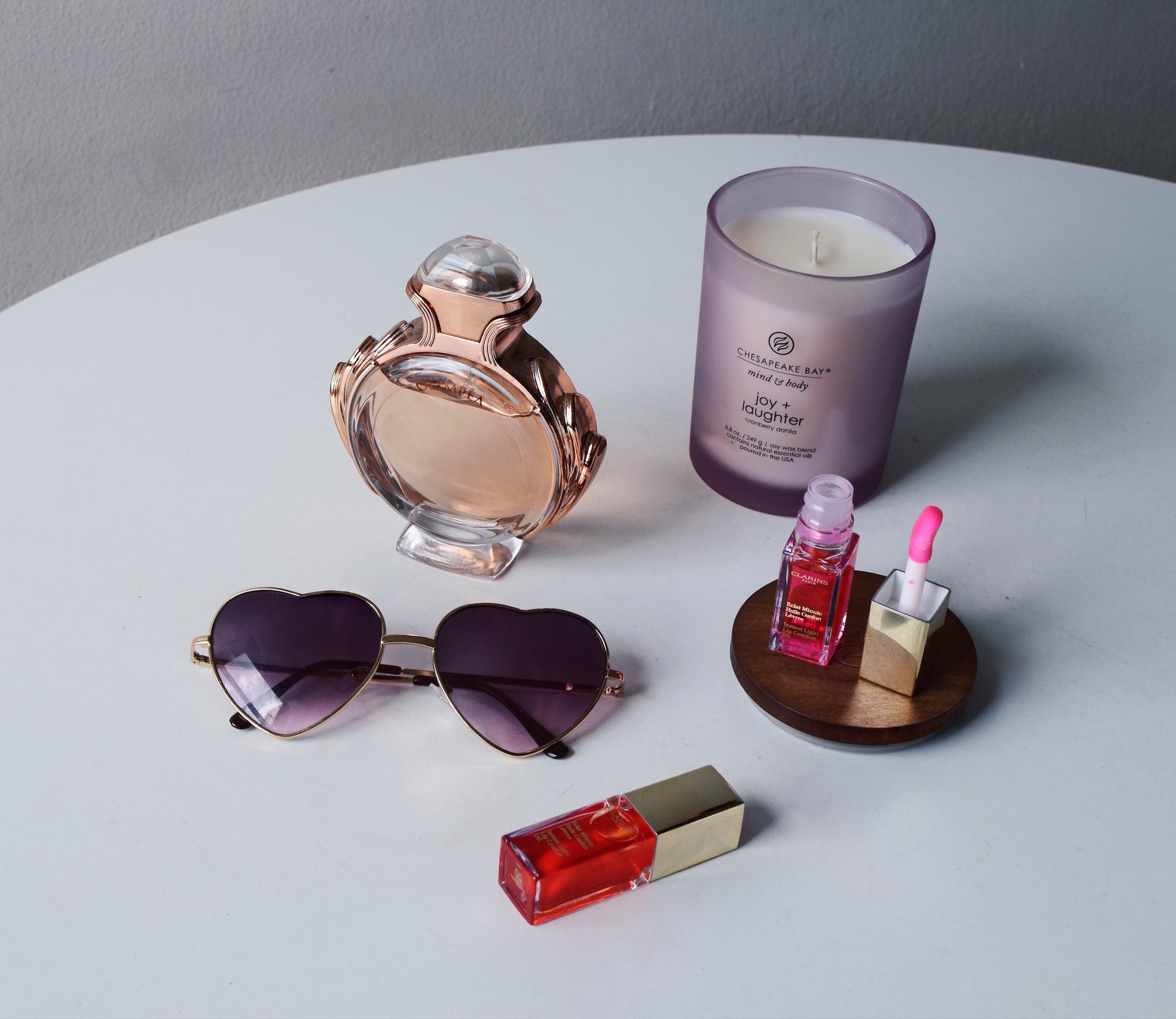 Softer Lips With Clarins Lip Oil Esther Santer Fashion Blog NYC Street Style Blogger Outfit OOTD Trendy Makeup Beauty Candle Flatlay Lipstick Color Shade Plumper Sunglasses Perfume Pretty Product Review Shop Girl Women Orange Tangerine Pink Candy Buy.JPG