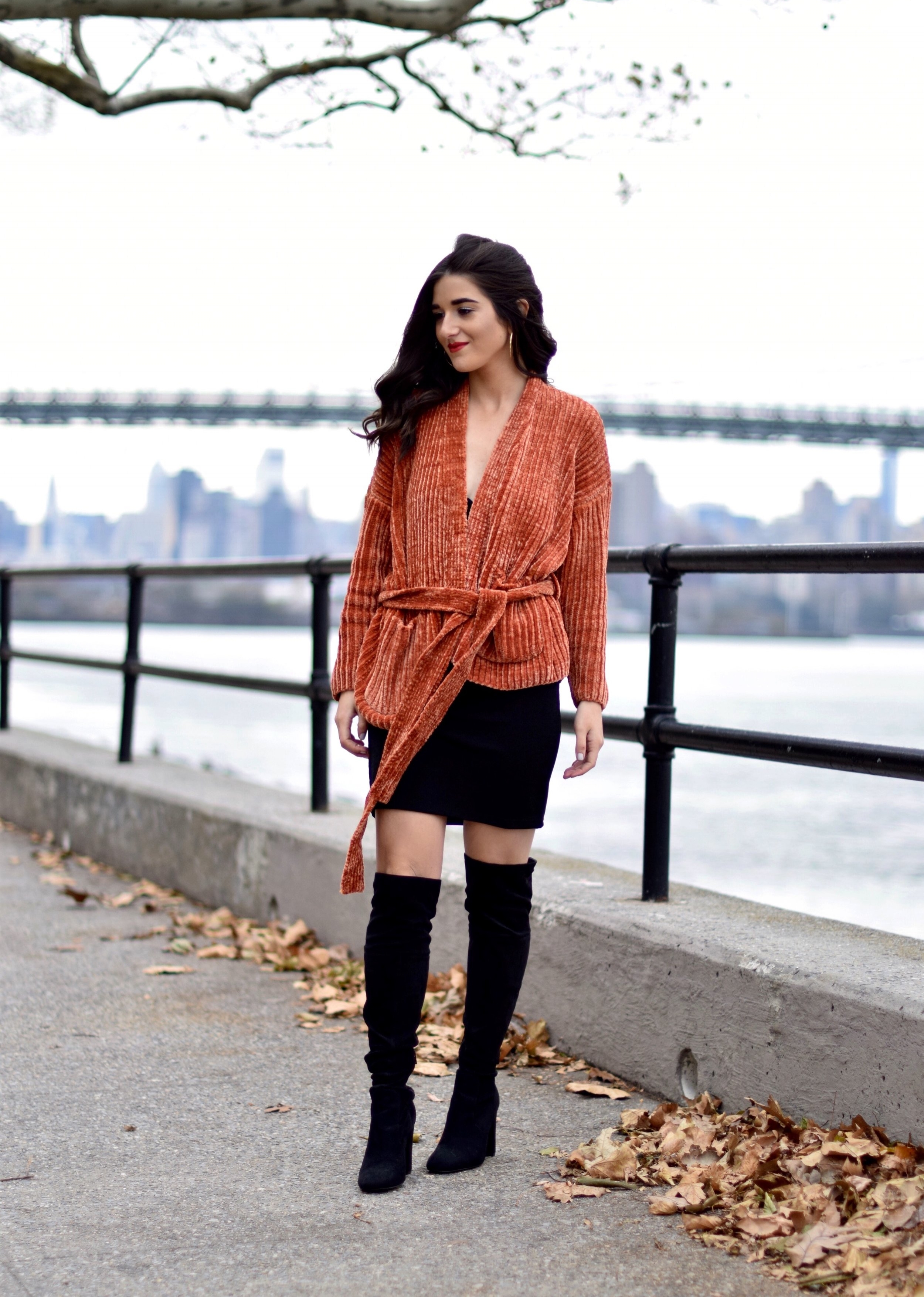 Orange Tie Sweater OTK Boots 10 Sweaters That Make The Perfect Holiday Gifts Esther Santer Fashion Blog NYC Street Style Blogger Outfit OOTD Trendy Urban Outfitters Girl Women  Black Over The Knee Boots Slip Dress Beautiful New York City Cozy OOTD.jpg