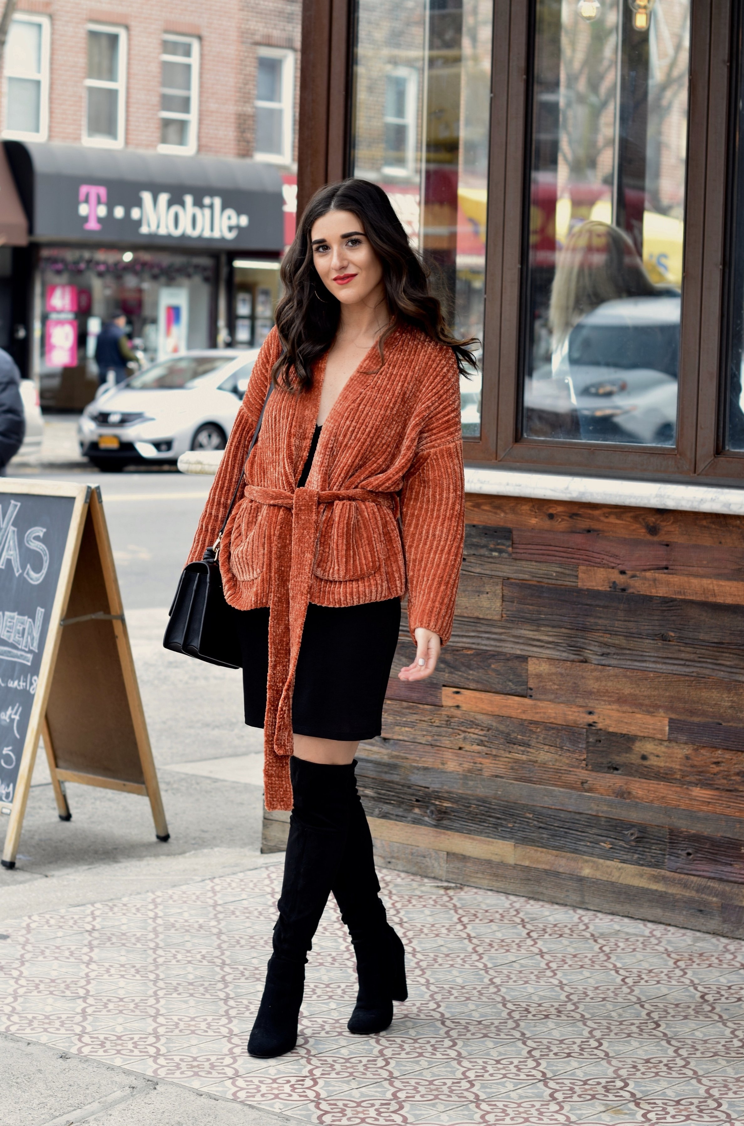 Orange Tie Sweater OTK Boots 10 Sweaters That Make The Perfect Holiday Gifts Esther Santer Fashion Blog NYC Street Style Blogger Outfit OOTD Trendy Urban Outfitters Girl Women Black Over The Knee Boots Slip Dress Beautiful New York City Cozy OOTD.jpg