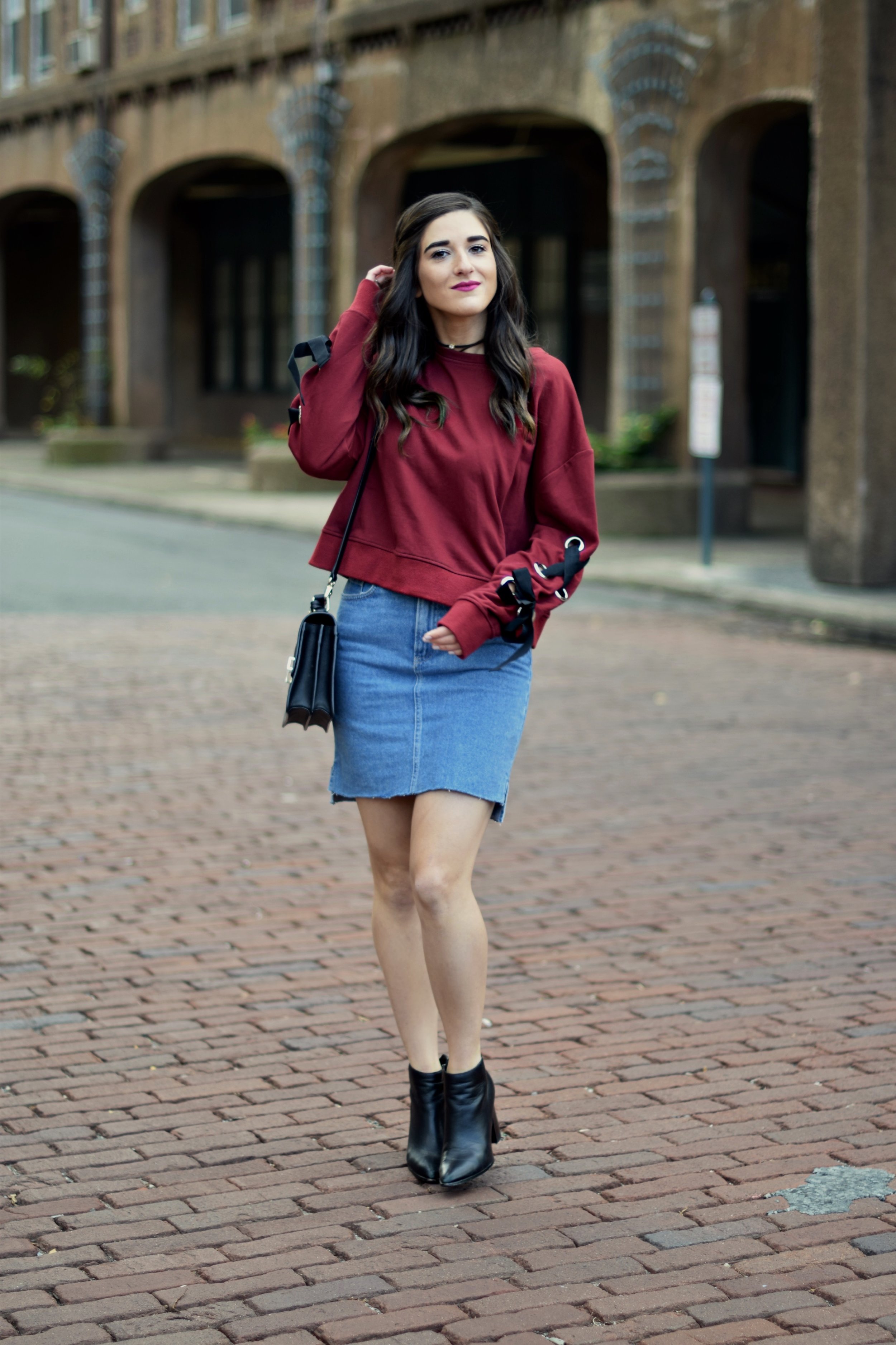 Red Lace-Up Sleeve Sweatshirt Denim Skirt 10 Things I'm Thankful For This Year Esther Santer Fashion Blog NYC Street Style Blogger Outfit OOTD Trendy Girl Women Choker Black Booties Hair Brunette Henri Bendel West 57th Schoolbag Winter Look Fall OOTD.jpg