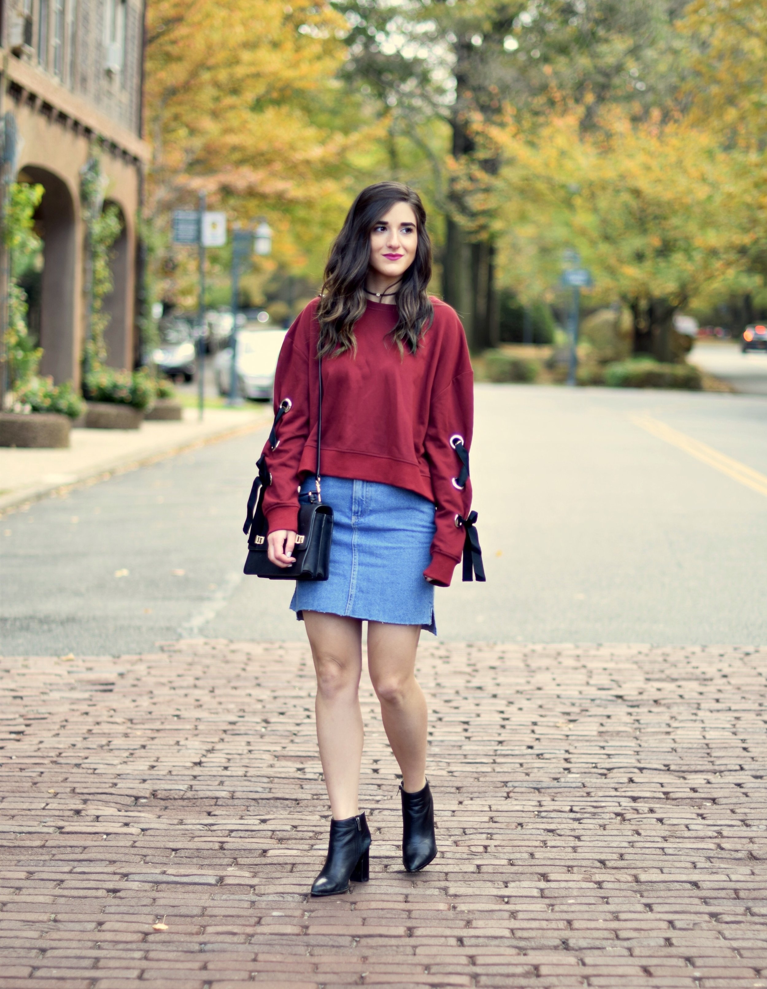 Red Lace-Up Sleeve Sweatshirt Denim Skirt 10 Things I'm Thankful For This Year Esther Santer Fashion Blog NYC Street Style Blogger Outfit OOTD Trendy Girl Women Choker Black Booties Hair Brunette Henri Bendel West 57th Schoolbag Winter  Look Fall Shop.jpg