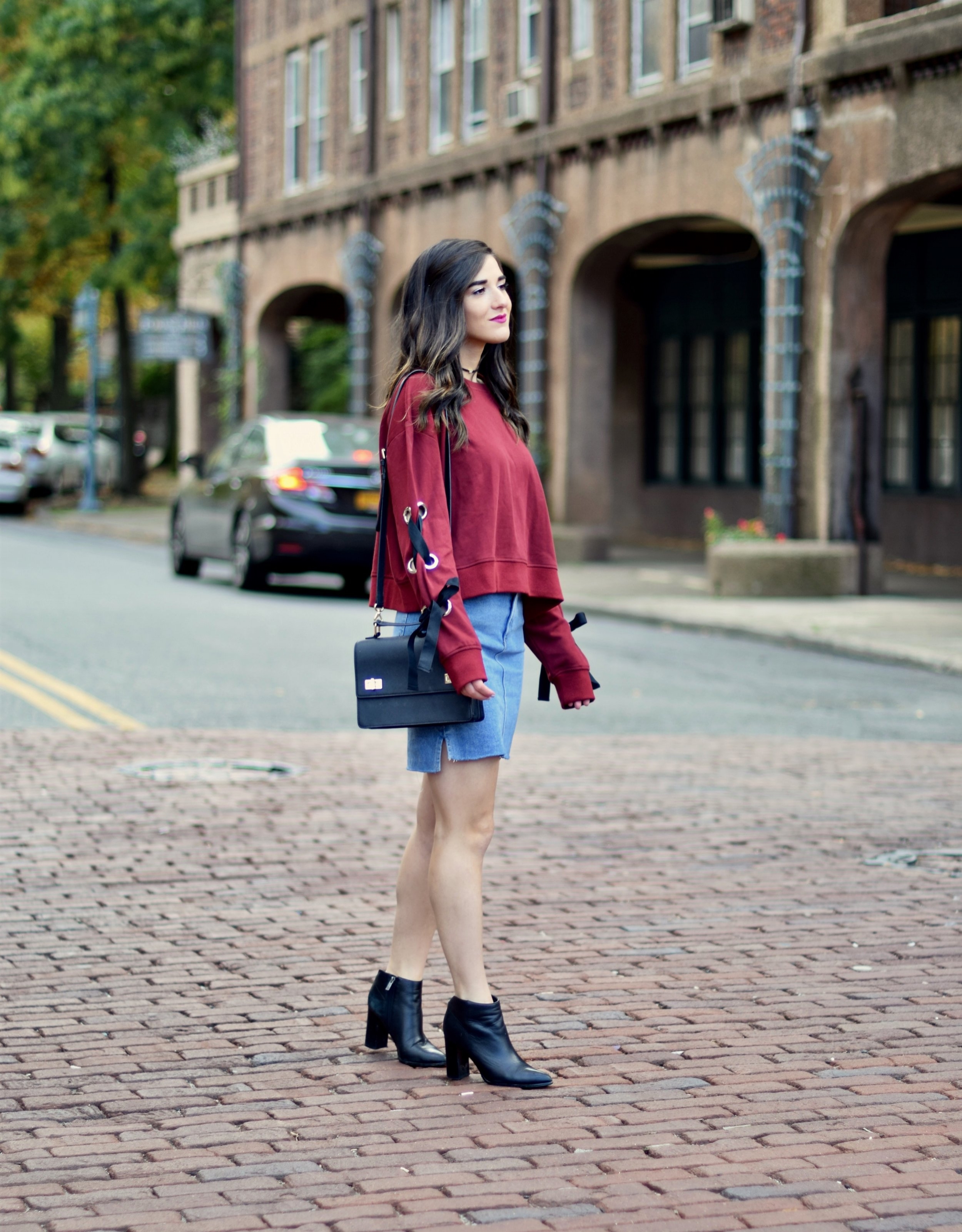 Red Lace-Up Sleeve Sweatshirt Denim Skirt 10 Things I'm Thankful For This Year Esther Santer Fashion Blog NYC Street Style Blogger Outfit OOTD Trendy Girl Women Choker Black Booties Hair Brunette Henri Bendel West  57th Schoolbag Winter Look Fall Shop.jpg