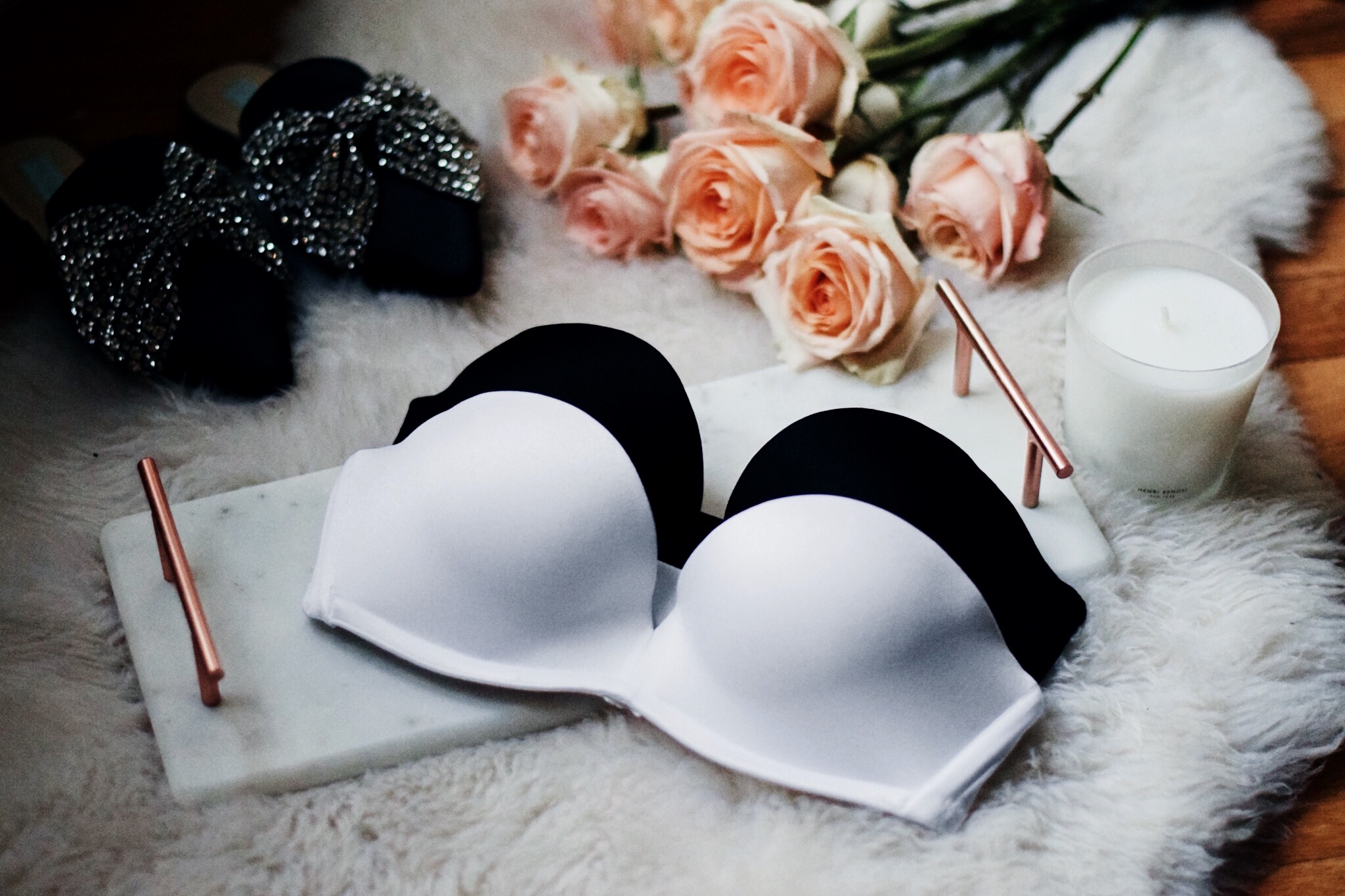 The Perfect Strapless UpBra Esther Santer Fashion Blog NYC Street Style Blogger Outfit OOTD Trendy Flatlay Candle Marble Gold Tray Roses Shoes Fur Sheepskin Strapless Bra Essentials The Right Fit Girl Women Flowers Beautiful White Pink Black Neutral.jpg
