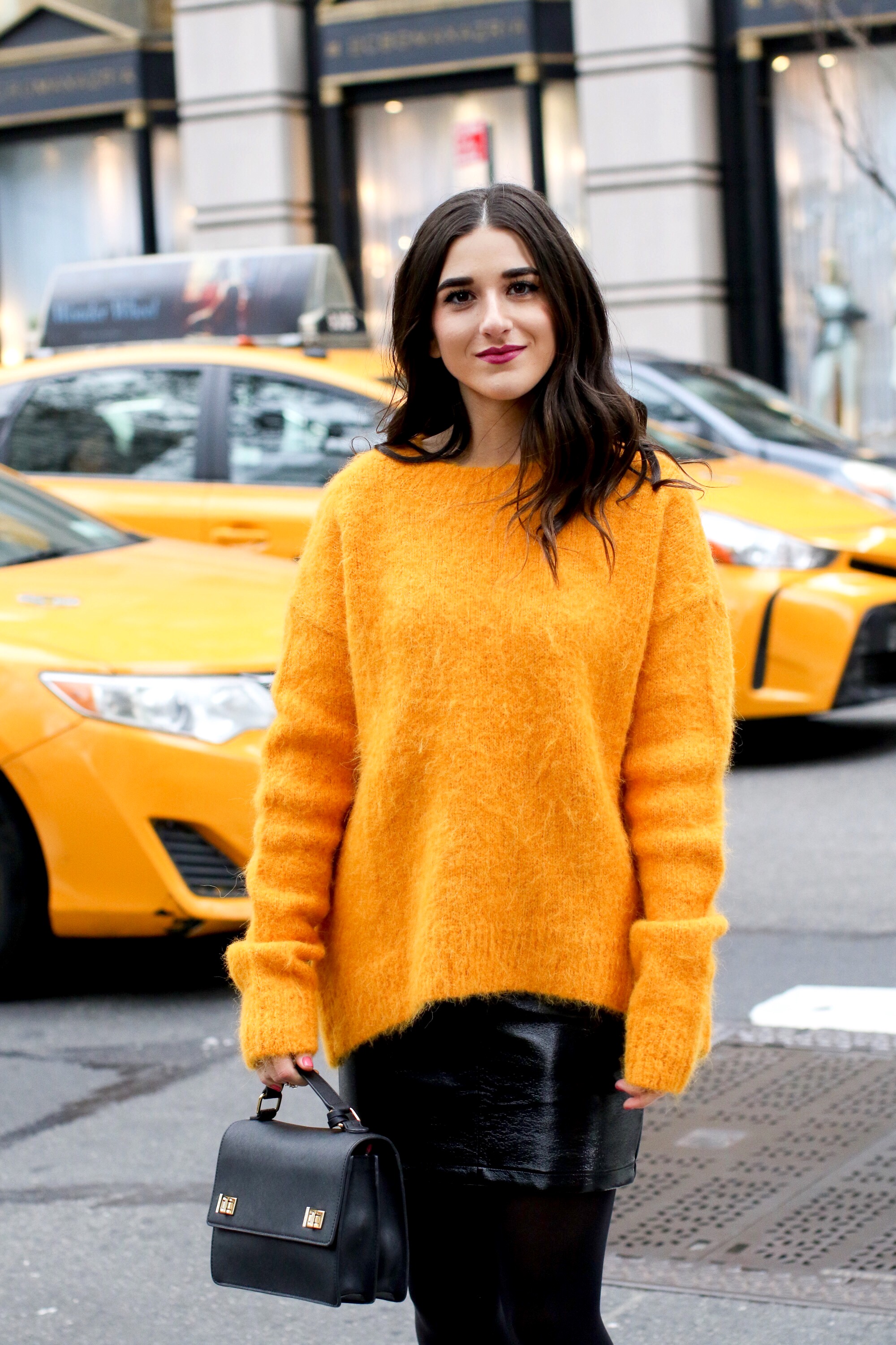 Yellow Sweater Pleather Skirt Why You Should Think Before You Unfollow Esther Santer Fashion Blog NYC Street Style Blogger Outfit OOTD Trendy Cozy Winter Look Girl Women Oversized Top New York City  Instagram Tips DSW Studded Boots H&M Topshop Details.jpg