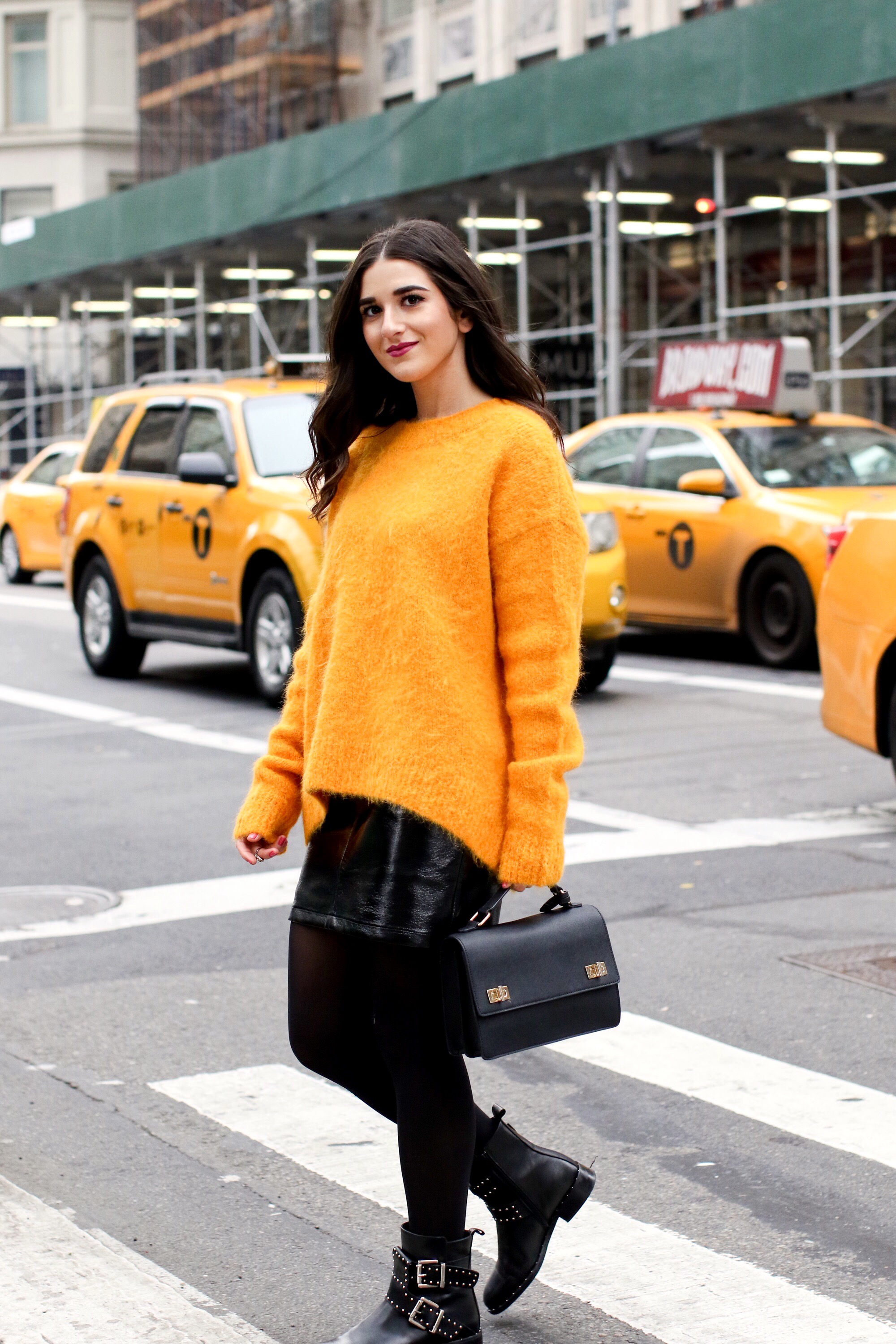 Yellow Sweater Pleather Skirt Why You Should Think Before You Unfollow Esther Santer Fashion Blog NYC Street Style Blogger Outfit OOTD Trendy Cozy Winter Look Girl Women Oversized Top New York City Instagram Tips DSW Studded  Boots H&M Topshop Details.jpg