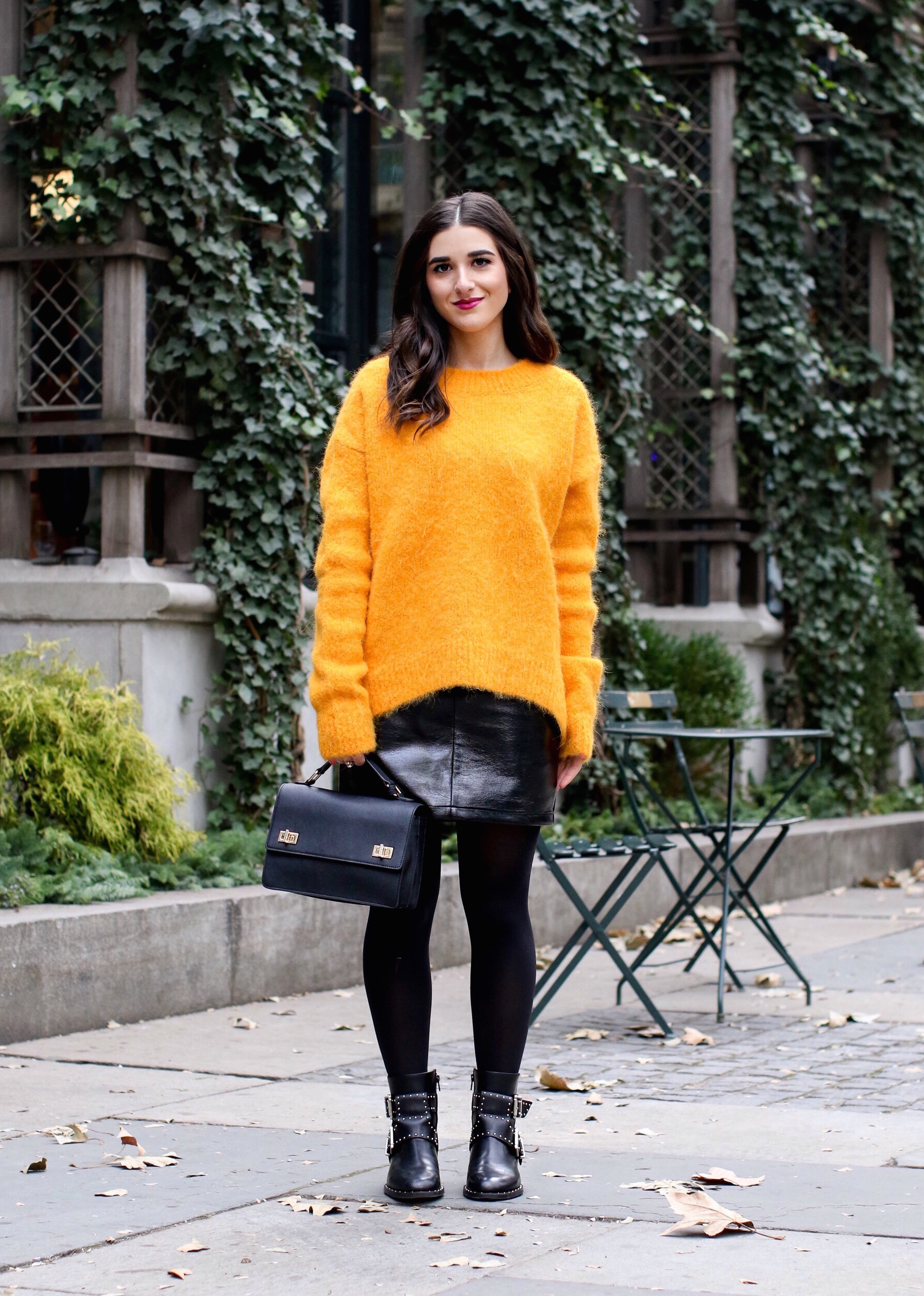 Yellow Sweater Pleather Skirt Why You Should Think Before You Unfollow Esther Santer Fashion Blog NYC Street Style Blogger Outfit OOTD Trendy Cozy Winter Look Girl Women Oversized Top New York City Instagram Tips DSW Studded Boots  H&M Topshop Details.jpg