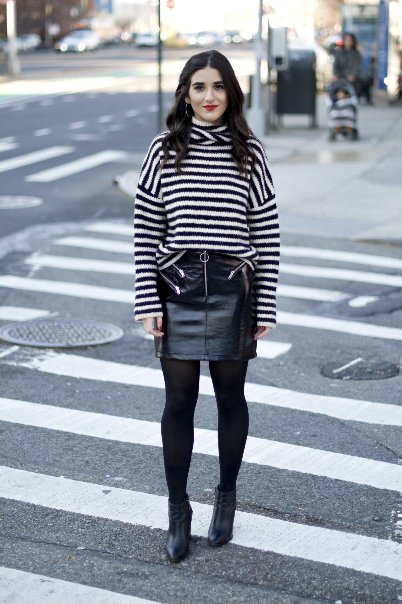 Striped Turtleneck Sweater + Pleather Skirt The Right Way To Ask Someone To Meet For Coffee Esther Santer Fashion Blog NYC Street Style Blogger Outfit OOTD Trendy Girl Women Black White Tights Ankle Booties Winter Hoops Earrings  Wavy Hair Shop Shoes.jpg