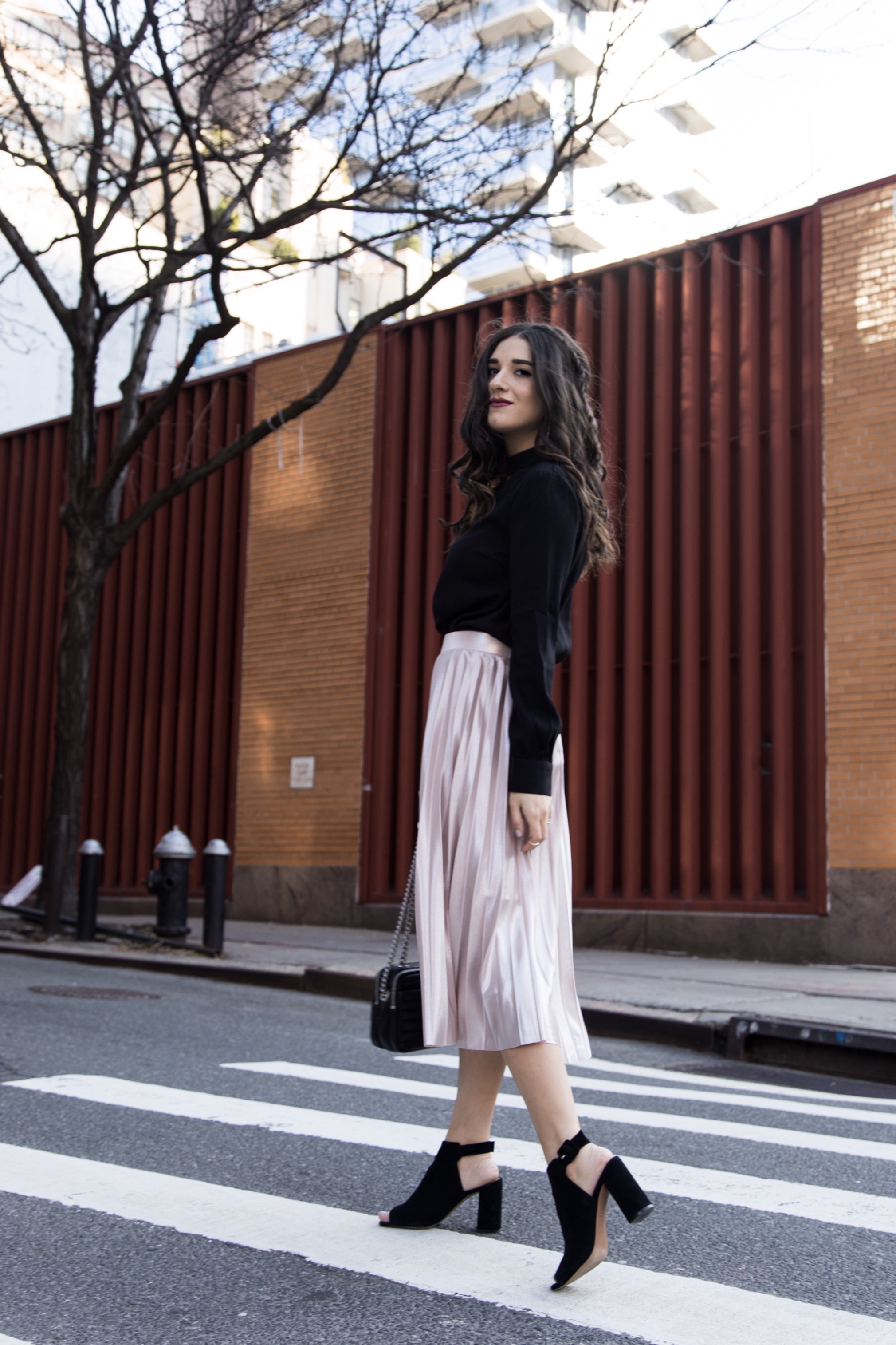 Metallic Midi Skirt Black Cutout Top How I Pack In A Carry On Esther Santer Fashion Blog NYC Street Style Blogger Outfit OOTD Trendy Feminine Girly Spring Hairstyle Waves Travel  Tips Honeymoon Photshoot Pose Wearing Shop Peep Toe Booties Henri Bendel.jpg