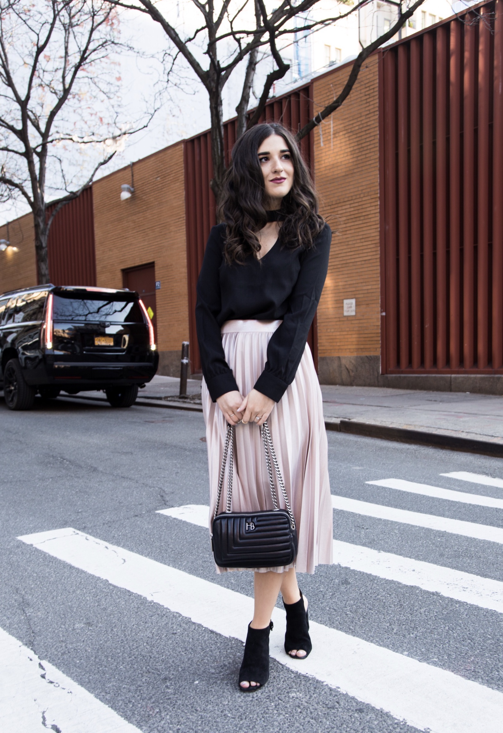 Metallic Midi Skirt Black Cutout Top How I Pack In A Carry On Esther Santer Fashion Blog NYC Street Style Blogger Outfit OOTD Trendy Feminine Girly Spring Hairstyle Waves Travel Tips Honeymoon Photshoot Pose Wearing Shop Peep Toe  Booties Henri Bendel.jpg